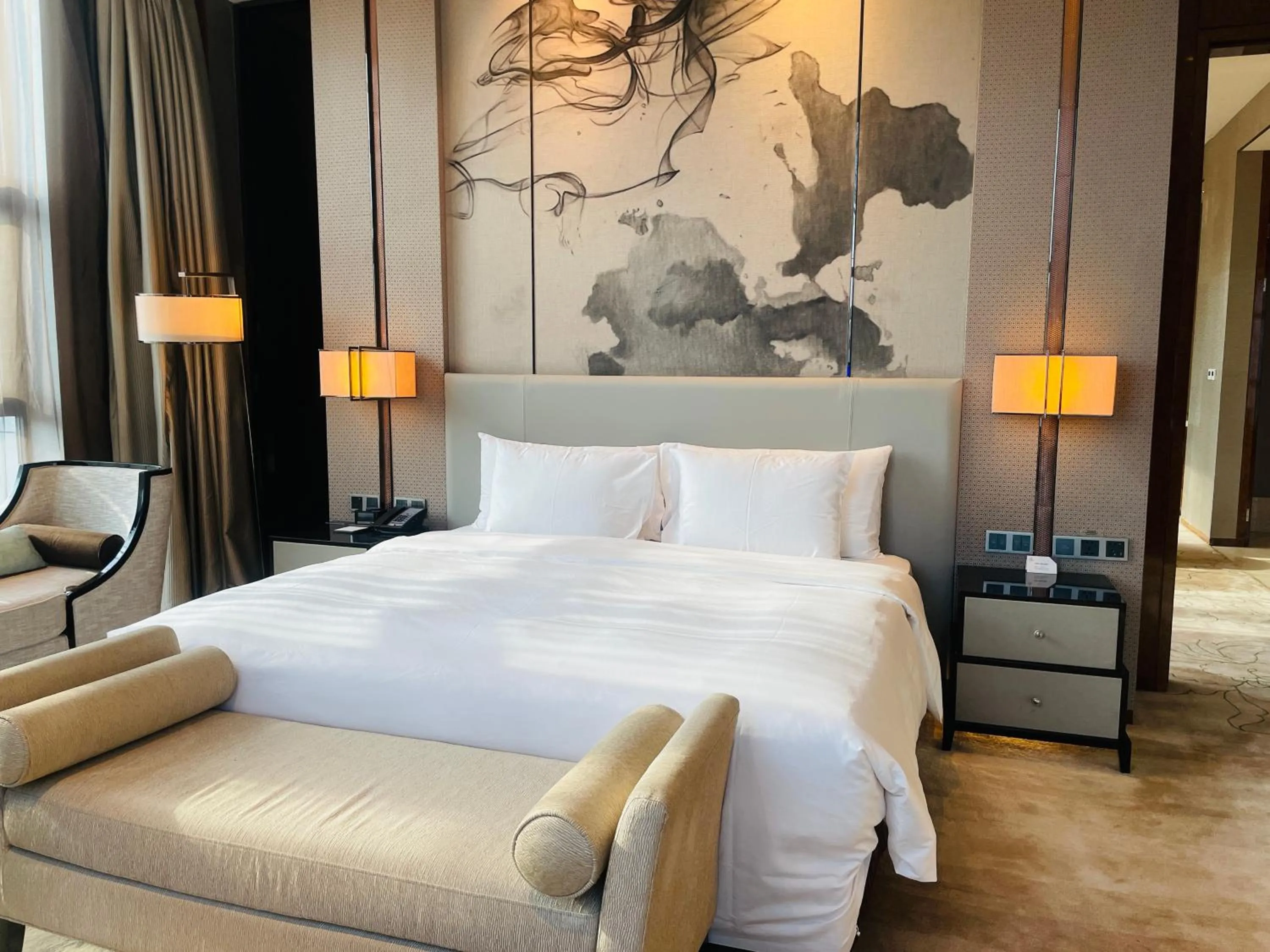 Bed in Maanshan Wanda Realm Hotel