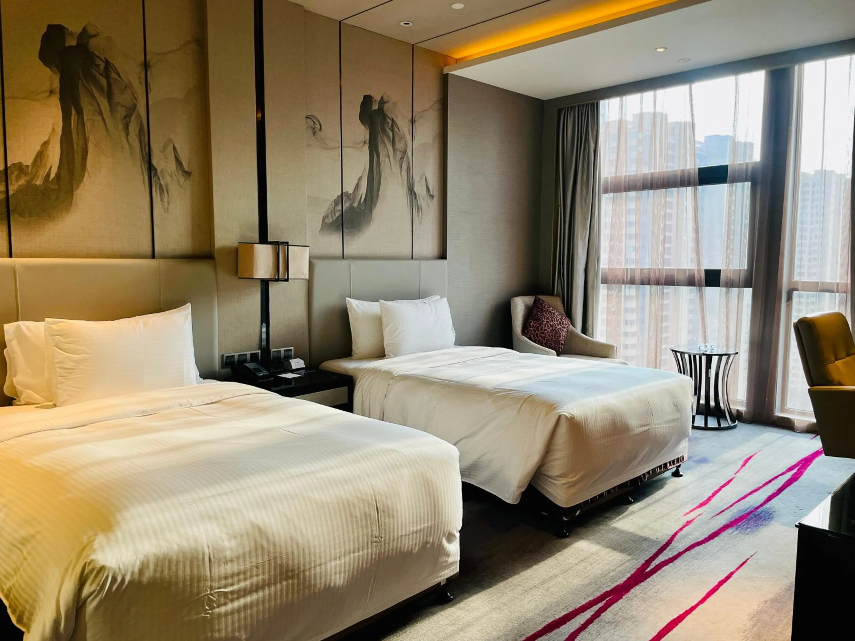 Bed in Maanshan Wanda Realm Hotel