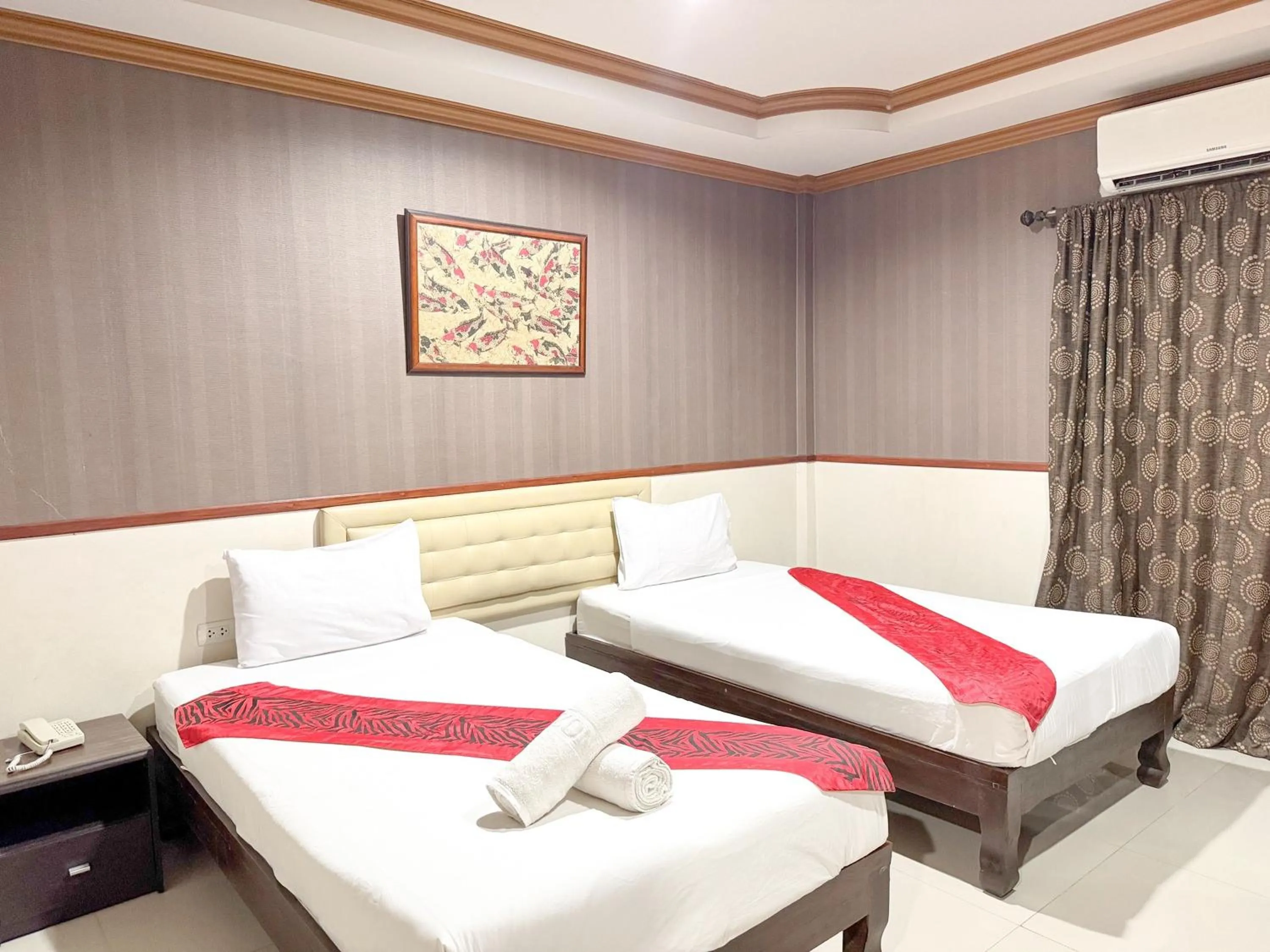 Bed in Grand Amazon Hotel