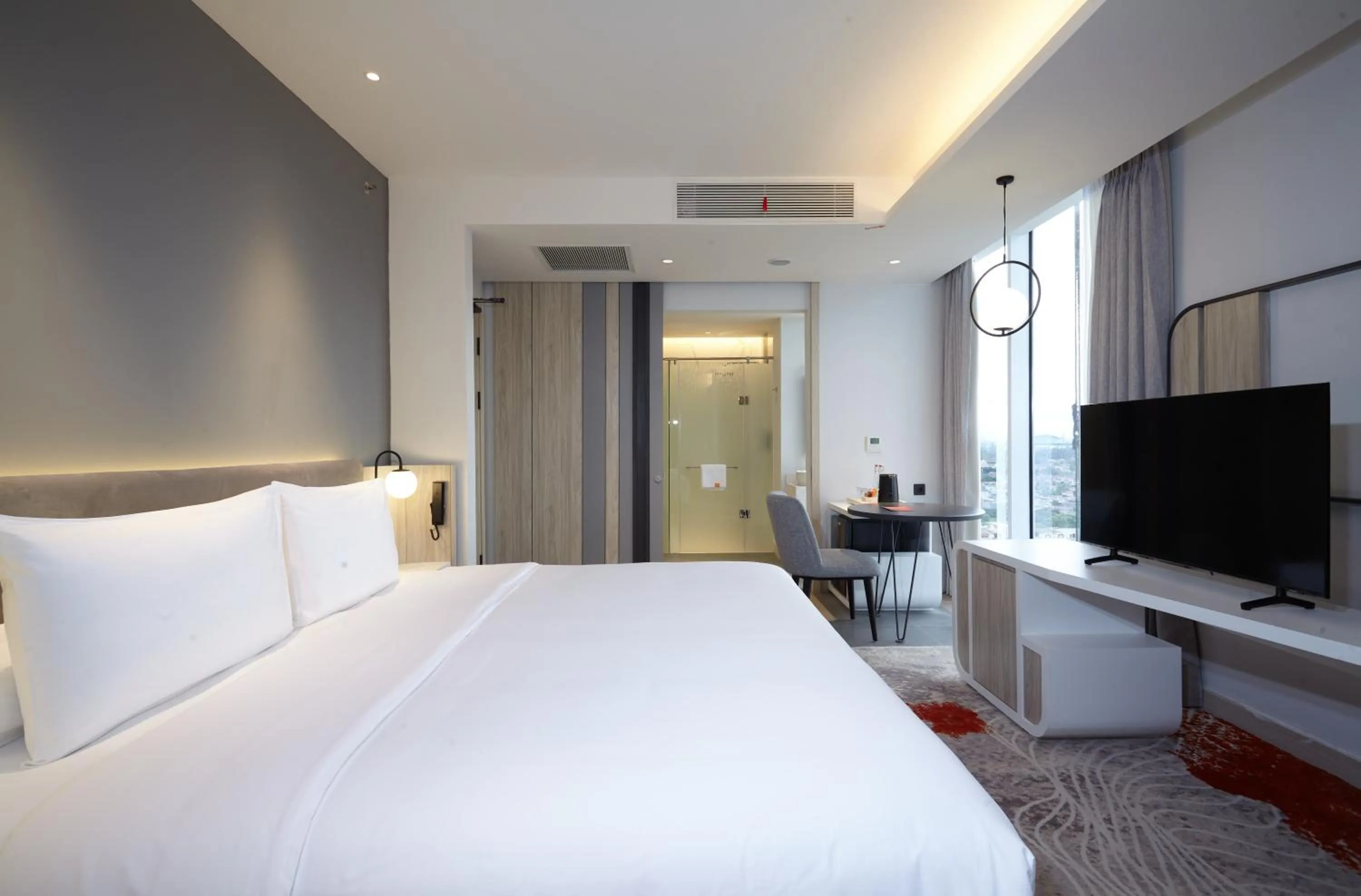 Bedroom, Bed in HARRIS Hotel & Convention Cibinong City Mall Bogor
