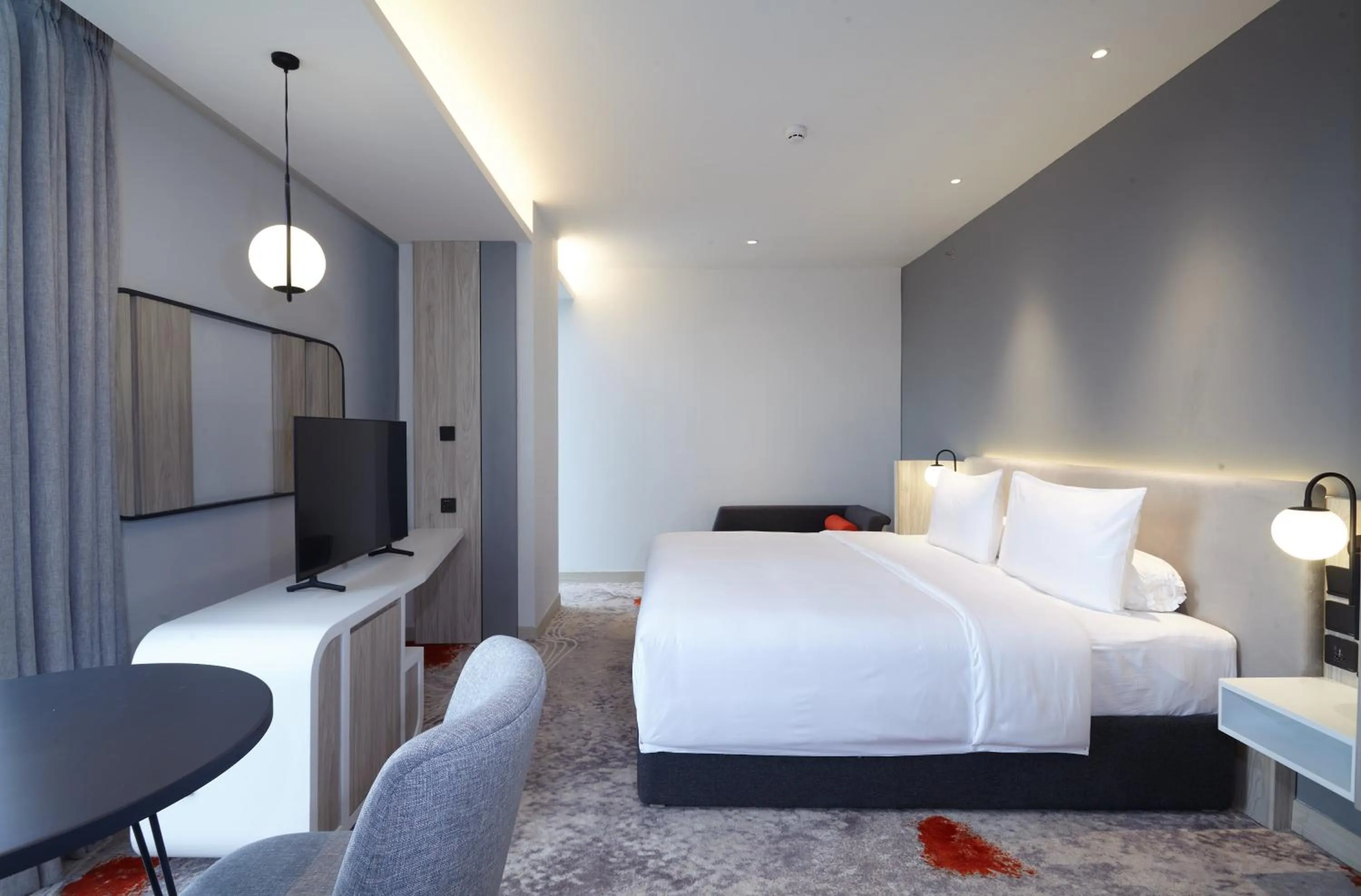 Bedroom, Bed in HARRIS Hotel & Convention Cibinong City Mall Bogor