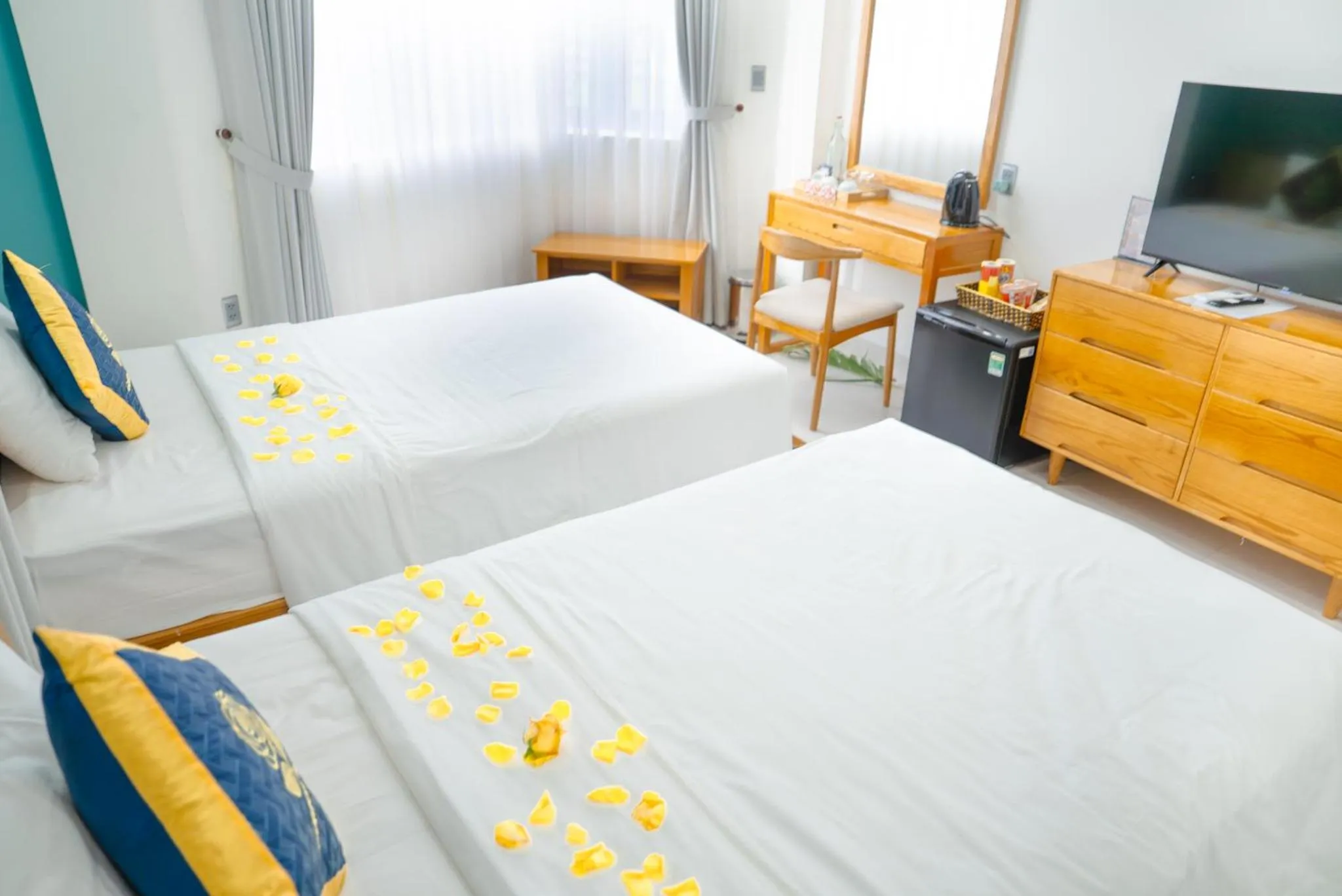 Bed in Golden Rose Hotel Con Dao