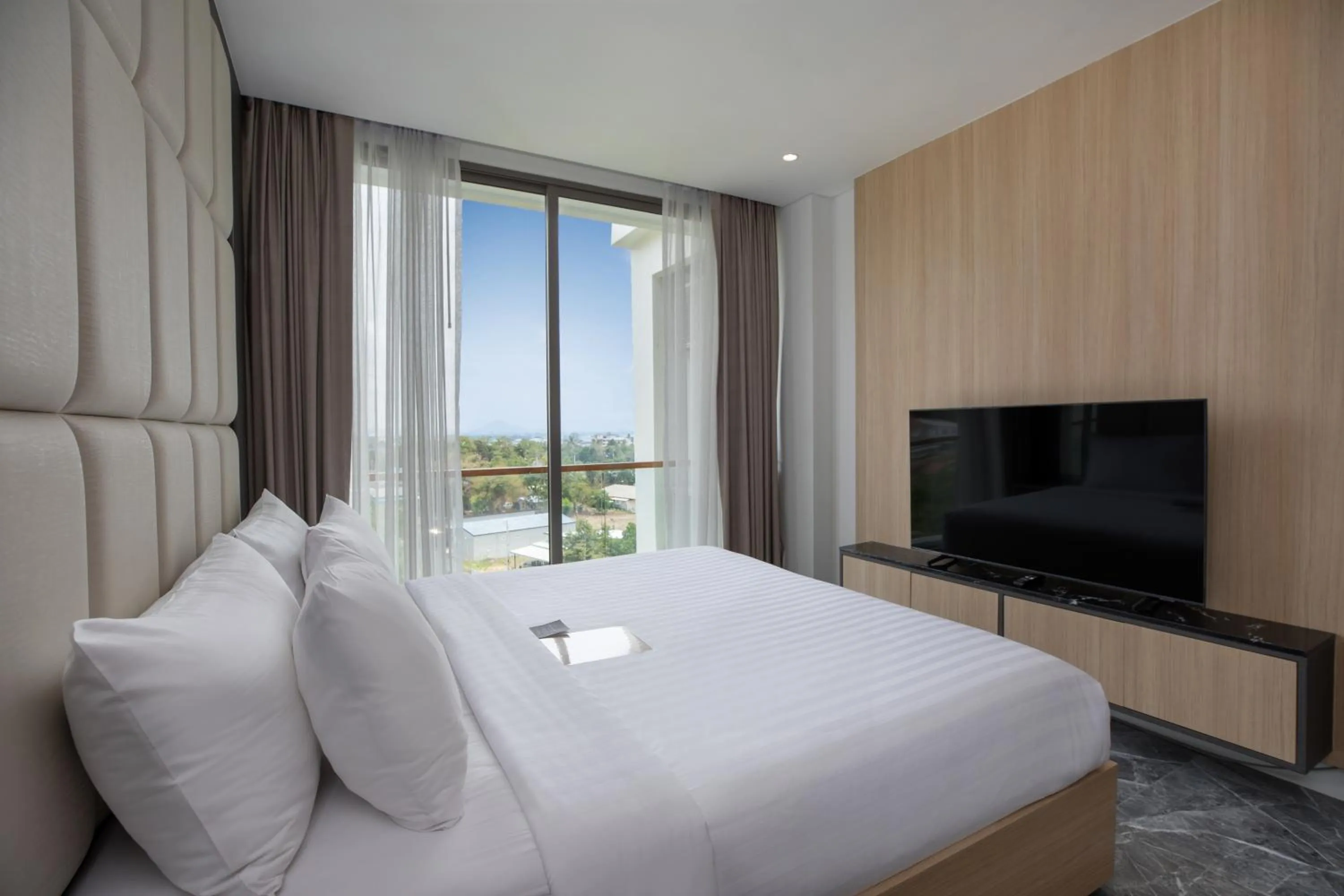 Bed in Elite Atoll Serviced Apartments Phuket