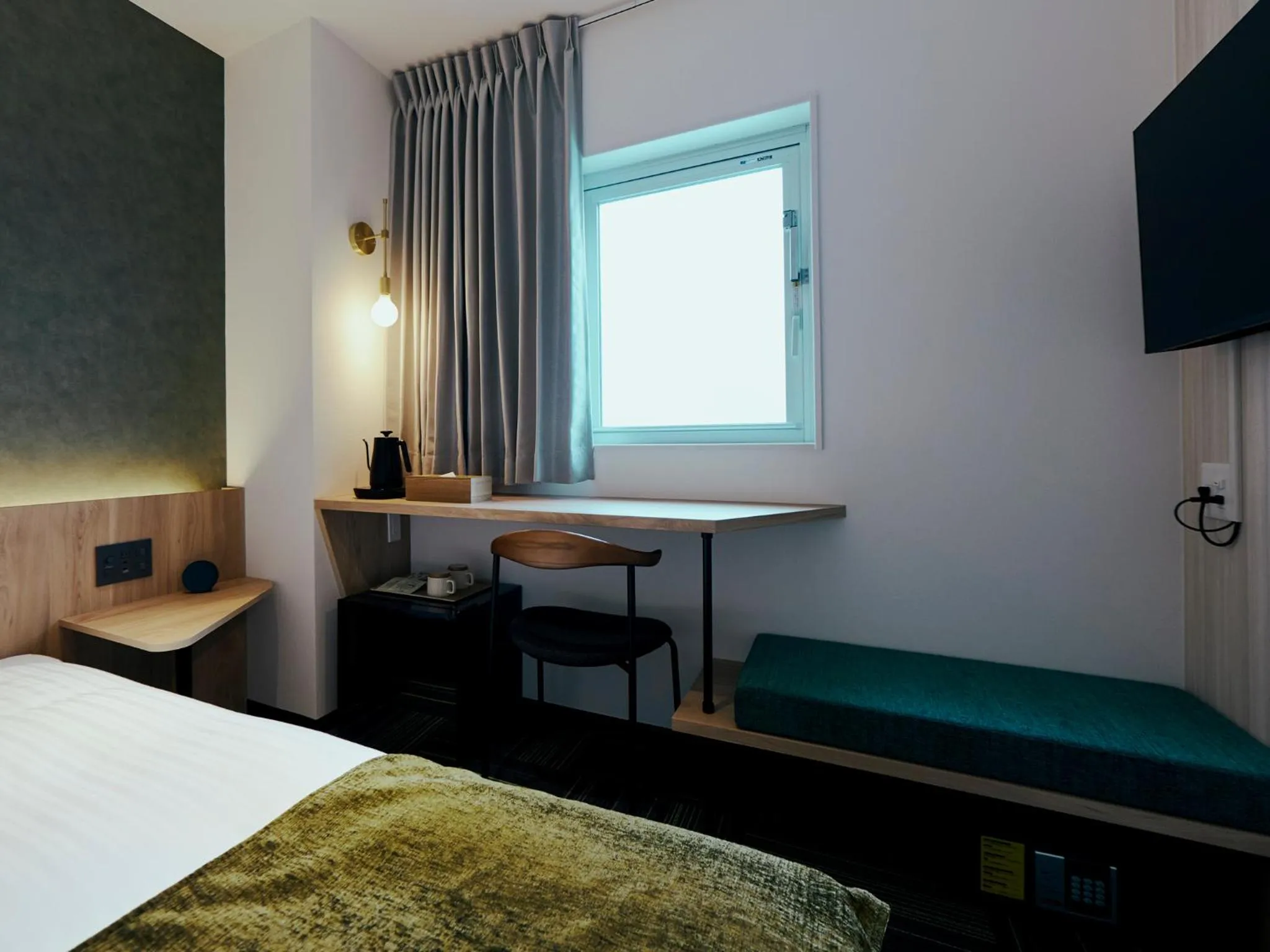 Bed in R Hotel Kansai Airport