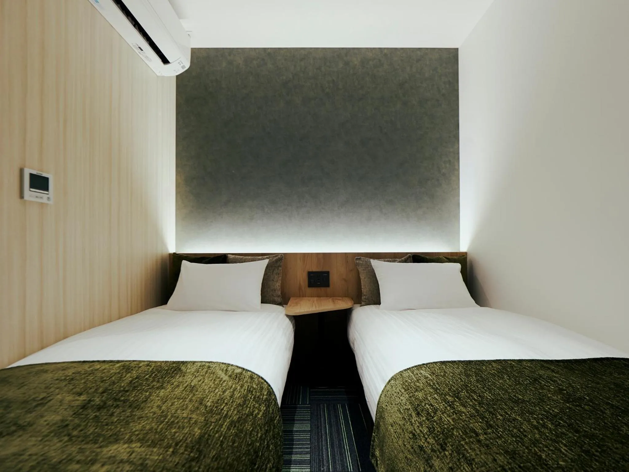 Bed in R Hotel Kansai Airport