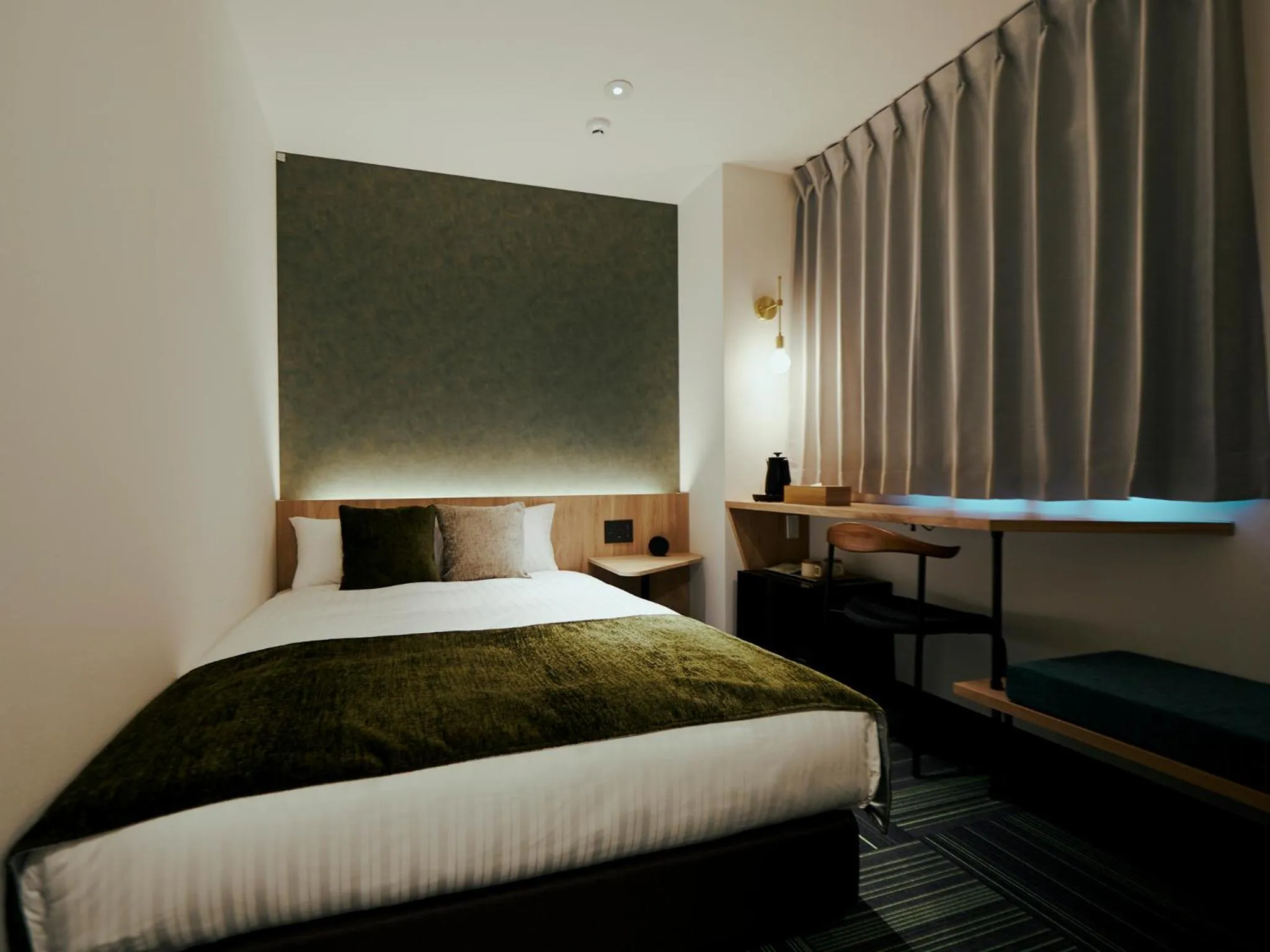 Bed in R Hotel Kansai Airport