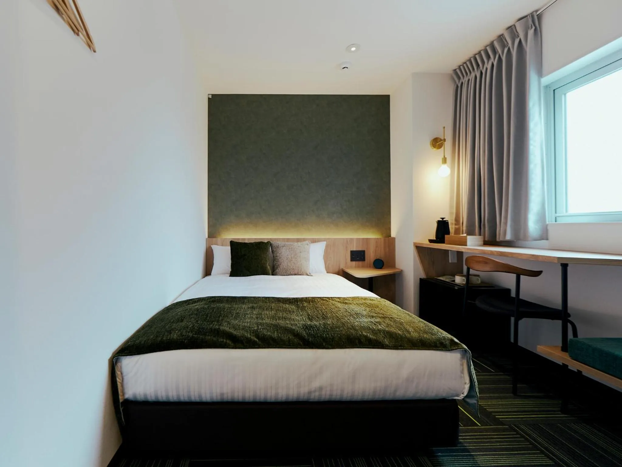 Bed in R Hotel Kansai Airport