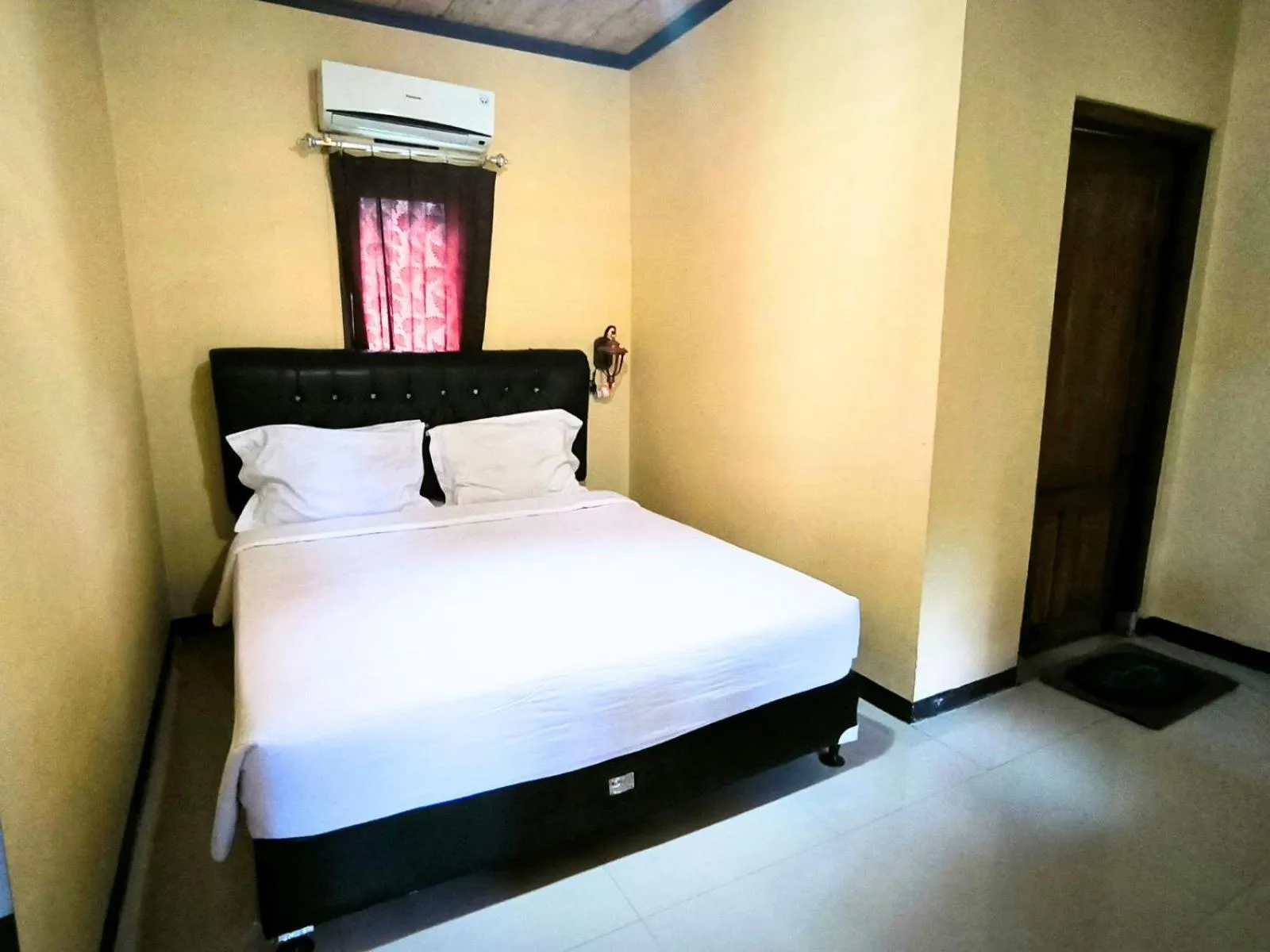Bed in Villa Setumbu powered by Cocotel