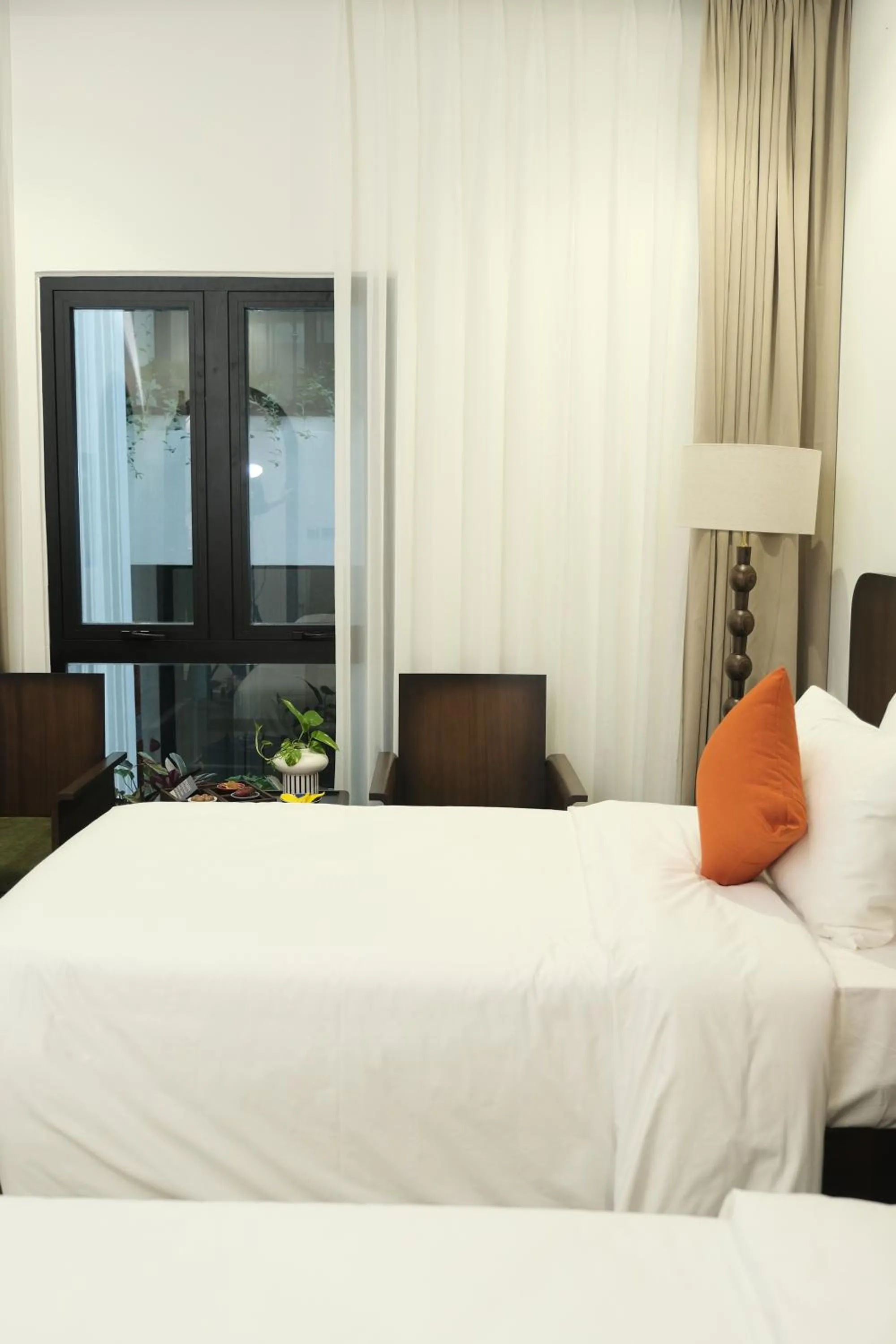 Bed in Paul Chabot Hotel