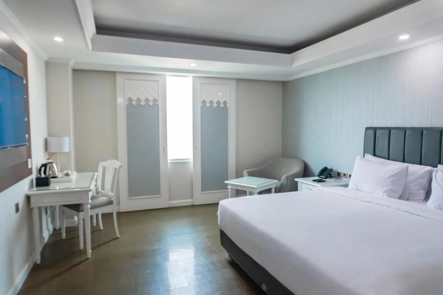 Bed in Tavia Heritage Hotel