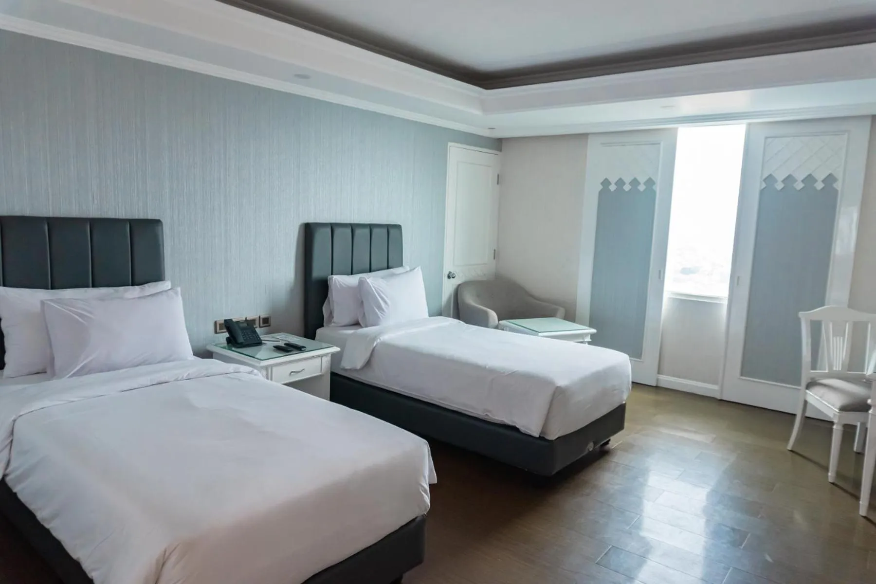 Bed in Tavia Heritage Hotel