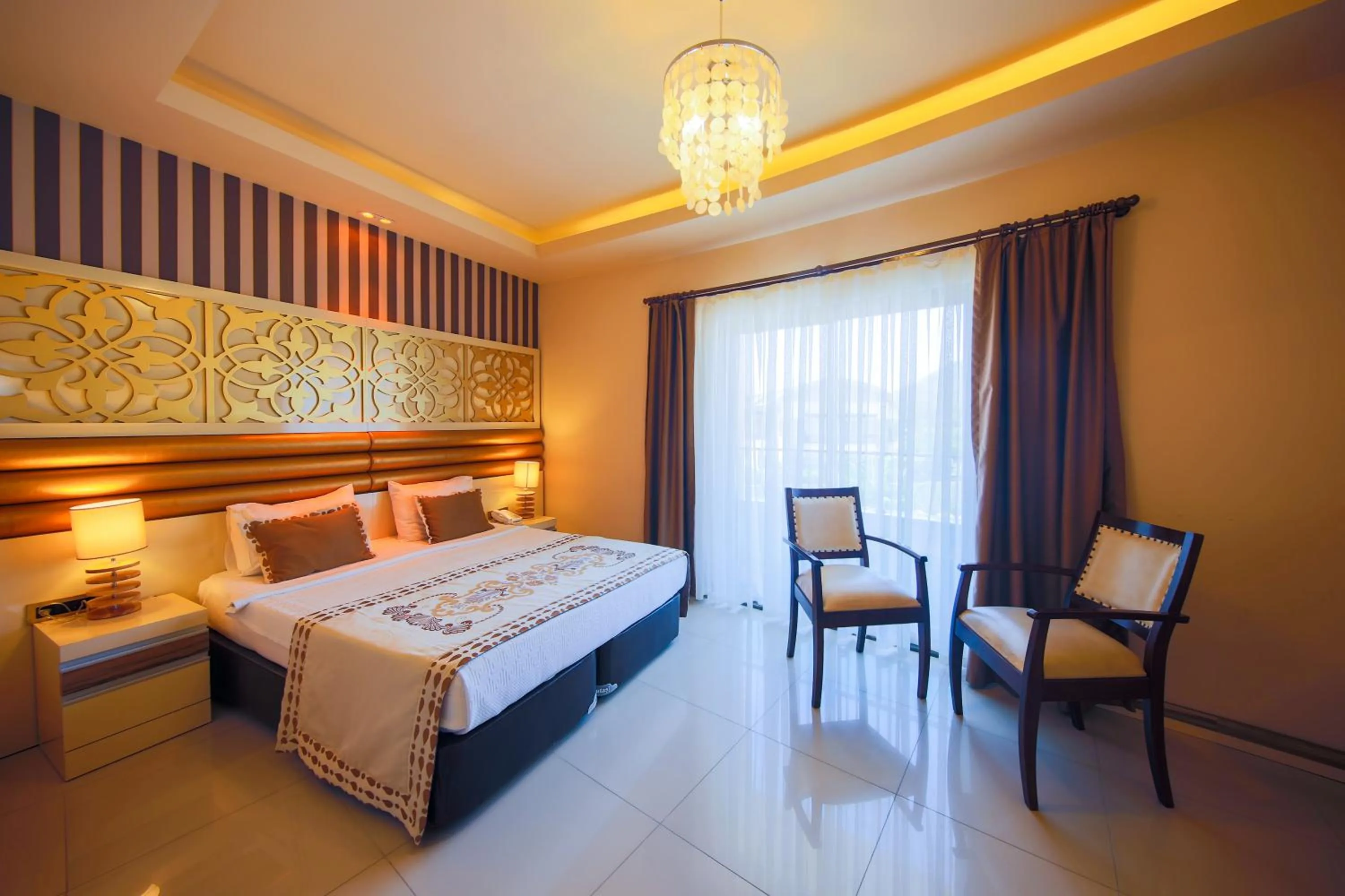Bed in Elamir Resort Hotel