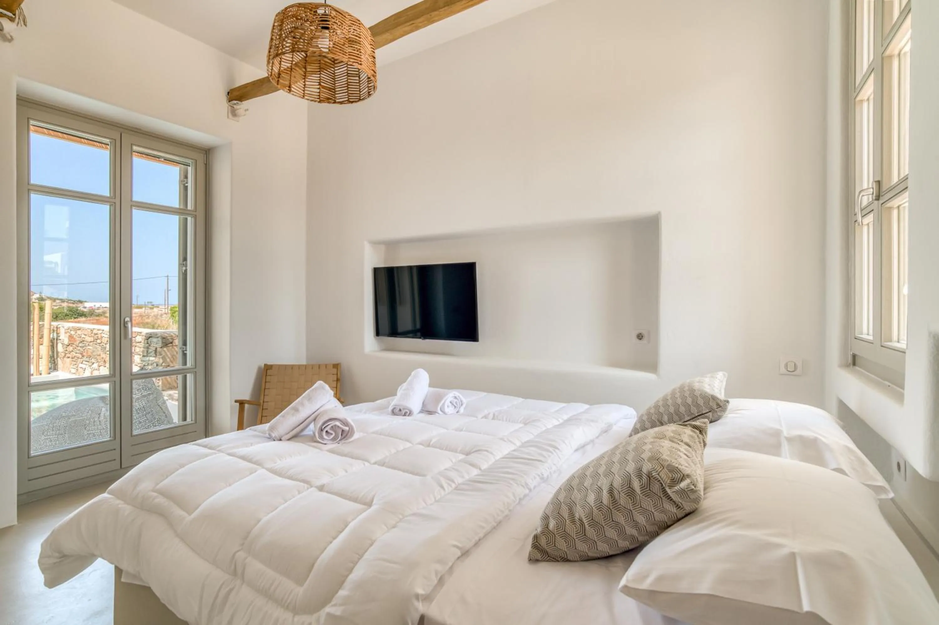 Bed in Lil Paros Luxury suites