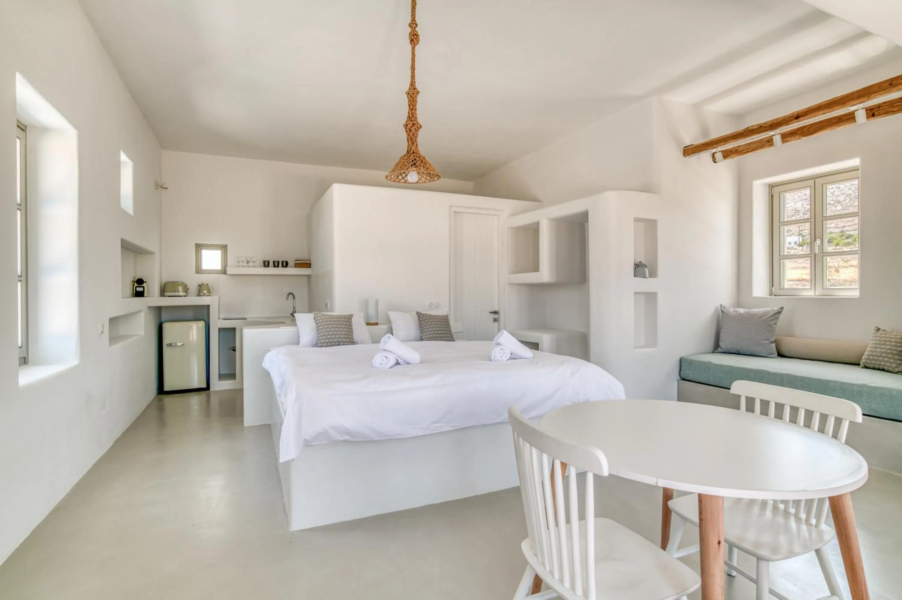 Bed in Lil Paros Luxury suites