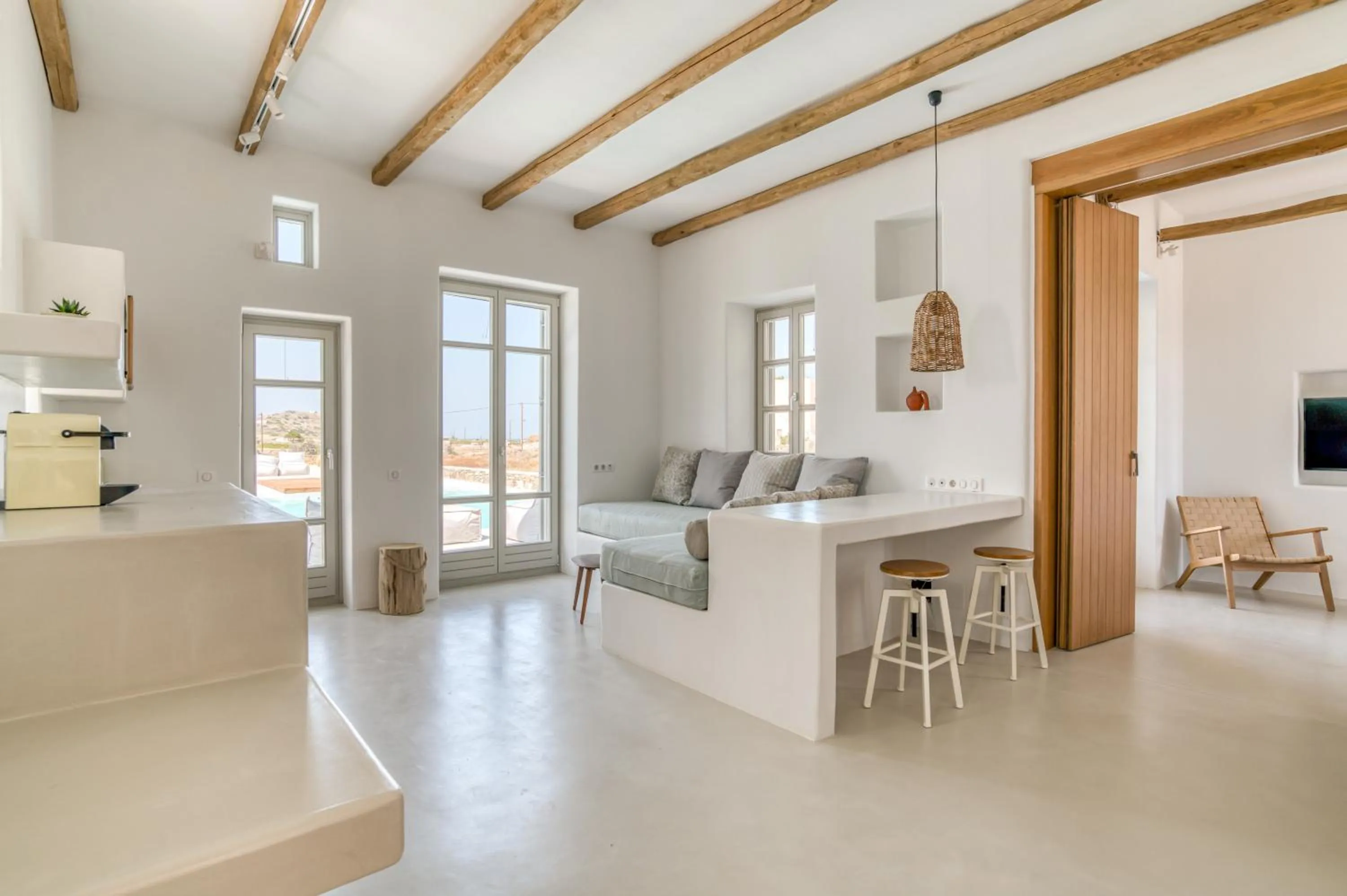 Living room, Bed in Lil Paros Luxury suites