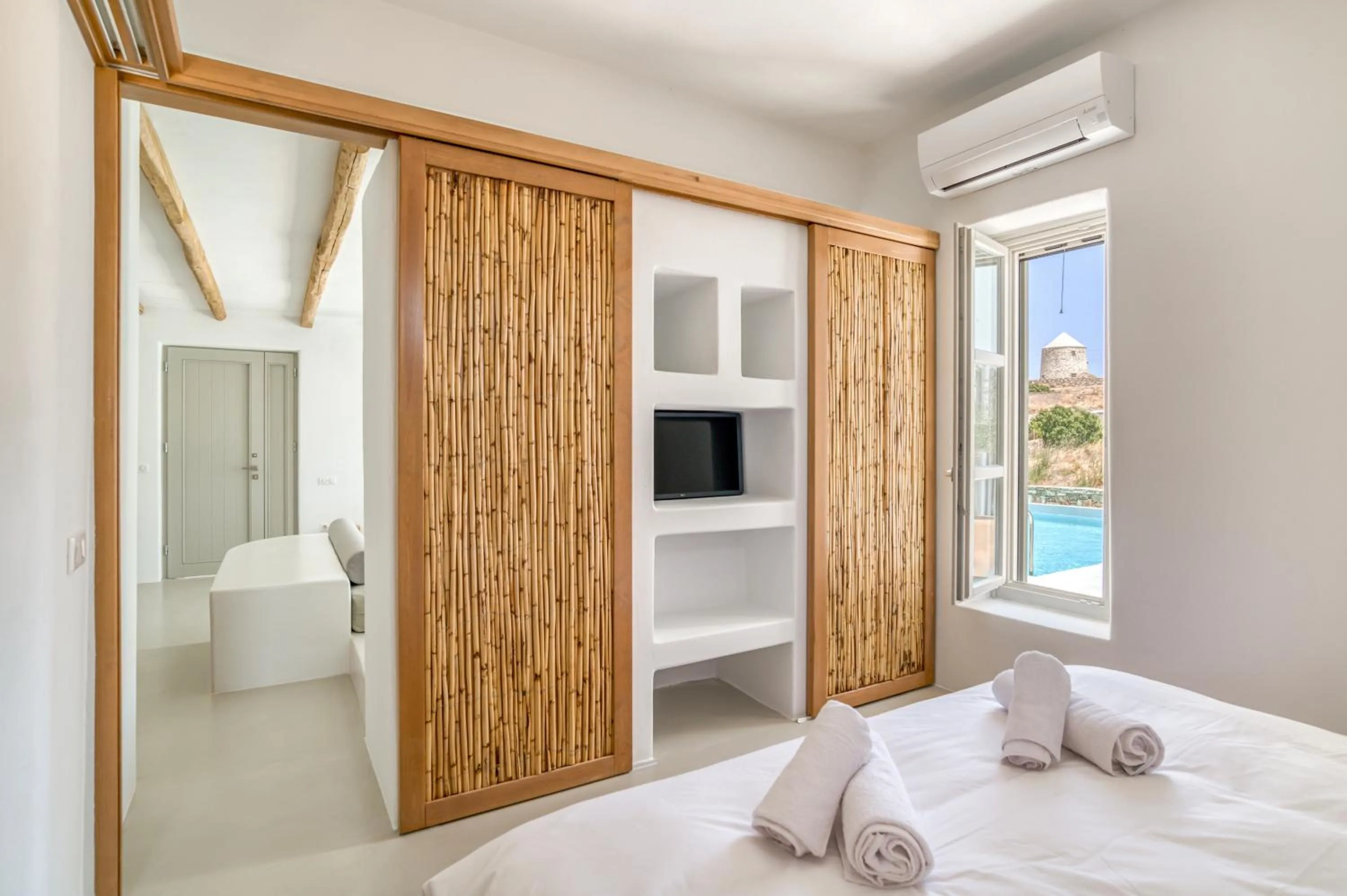 Bed in Lil Paros Luxury suites