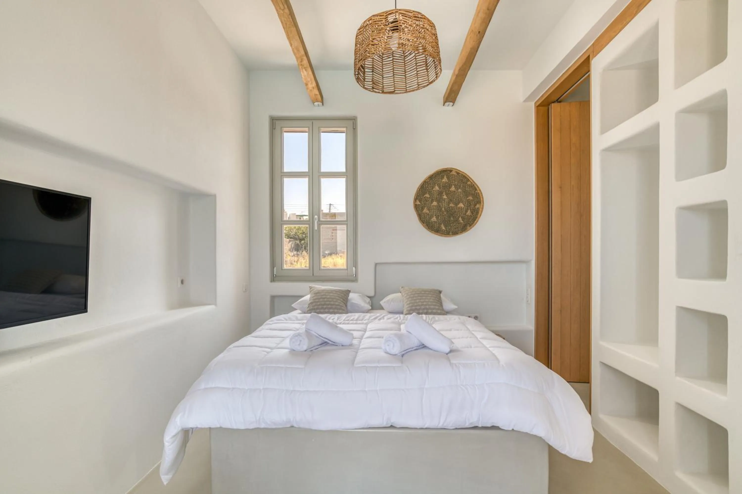 Bed in Lil Paros Luxury suites