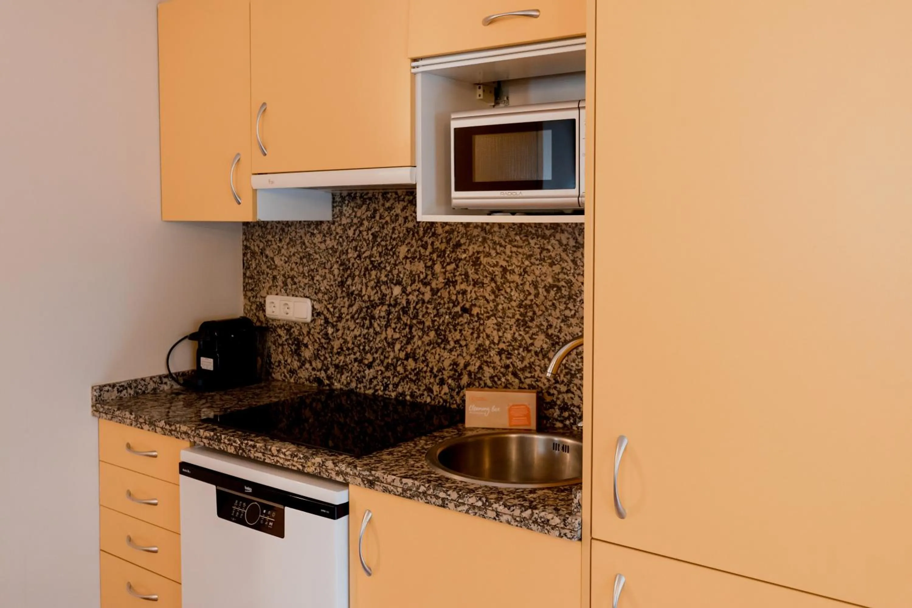 Kitchen or kitchenette in Pierre & Vacances La Merceria