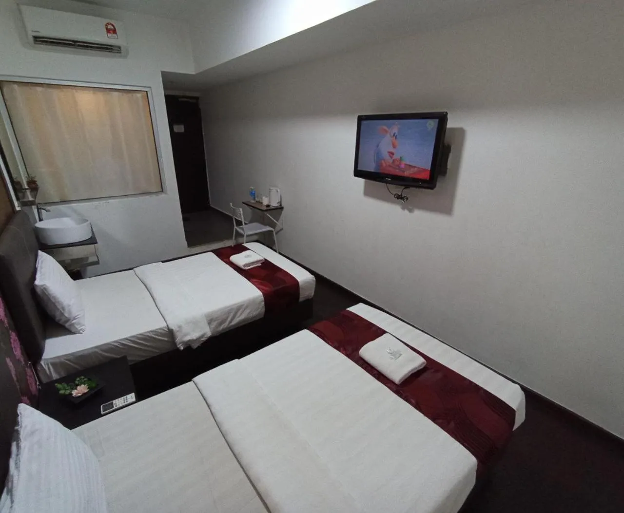 Bed in Warisan Hotel Kota Kinabalu