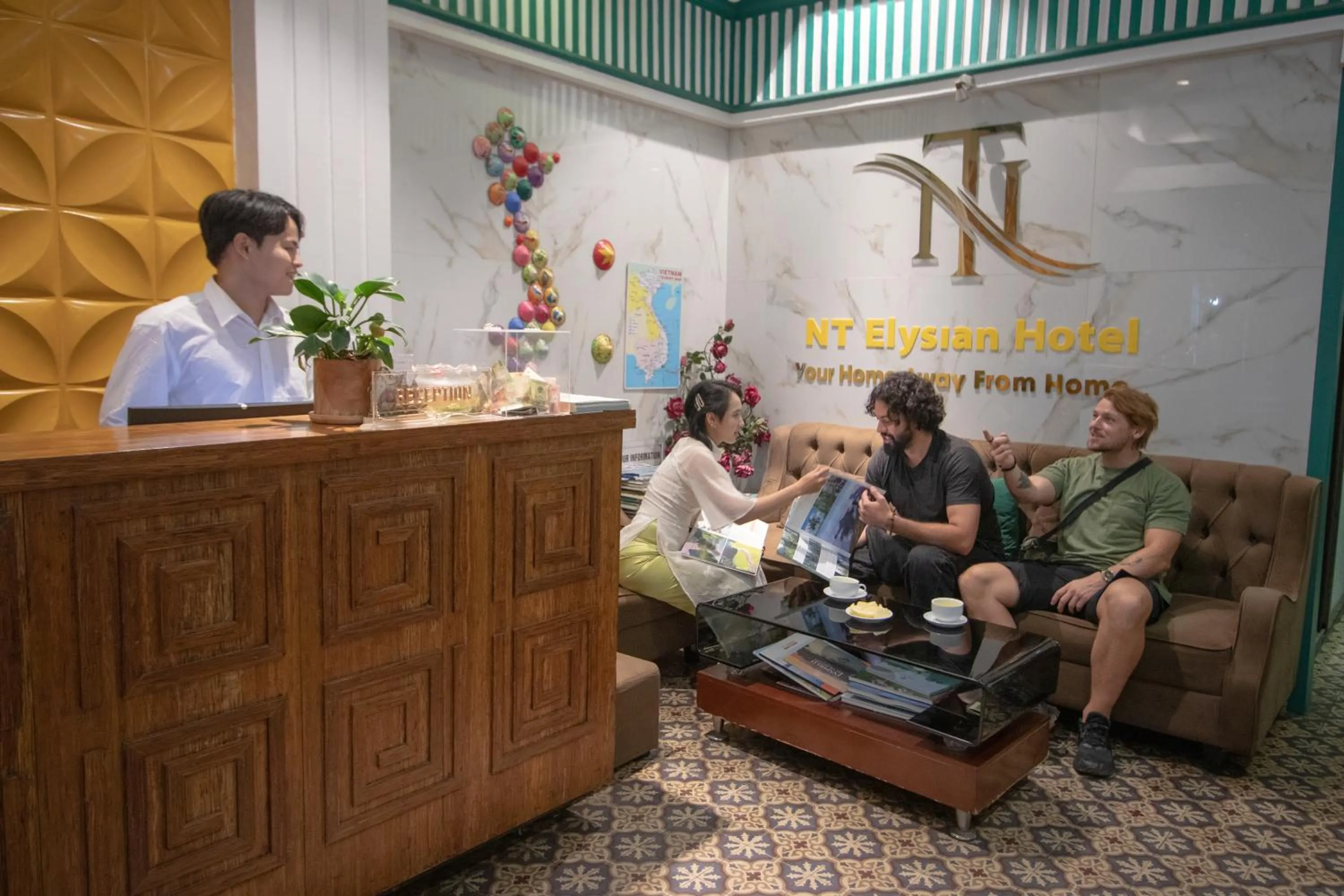 Lobby or reception in NT Elysian hotel