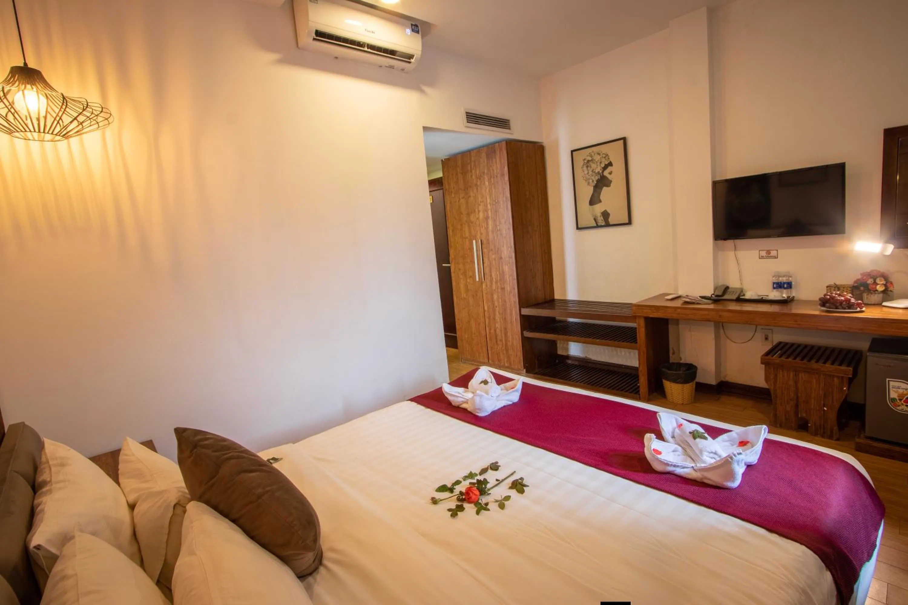 Bed in NT Elysian hotel