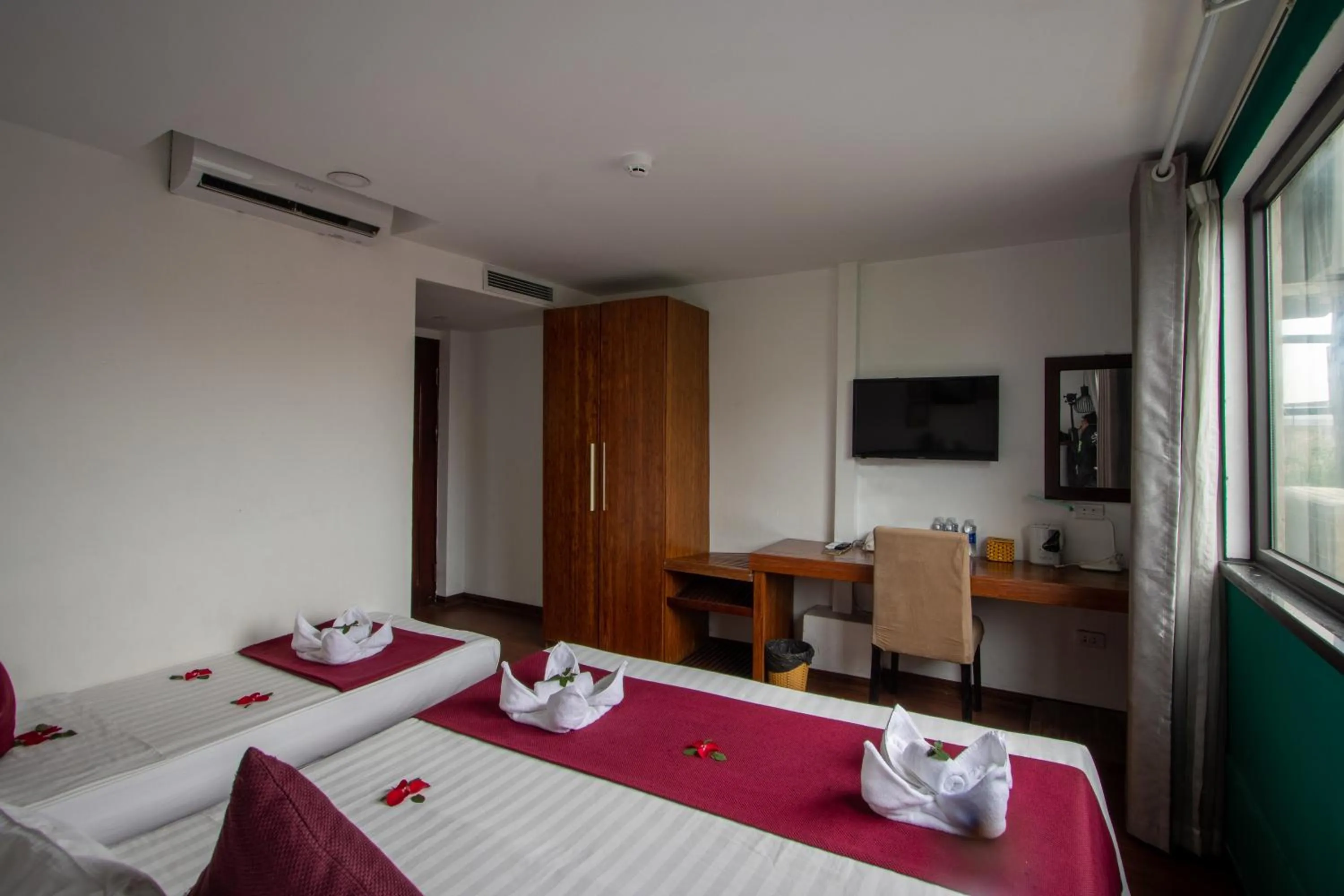 Bed in NT Elysian hotel