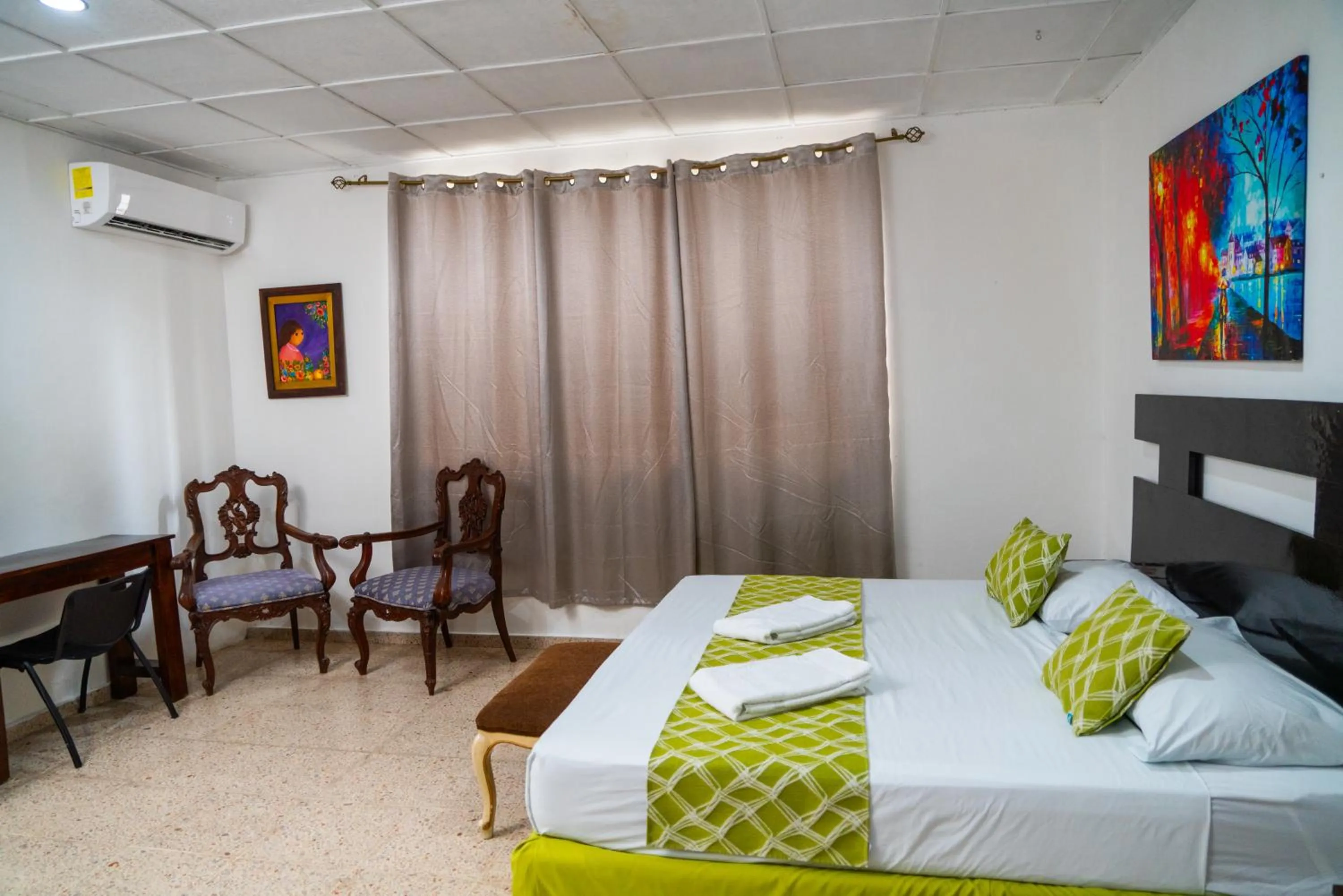 Bedroom, Bed in Suites & Apartments San Benito - Zona Rosa