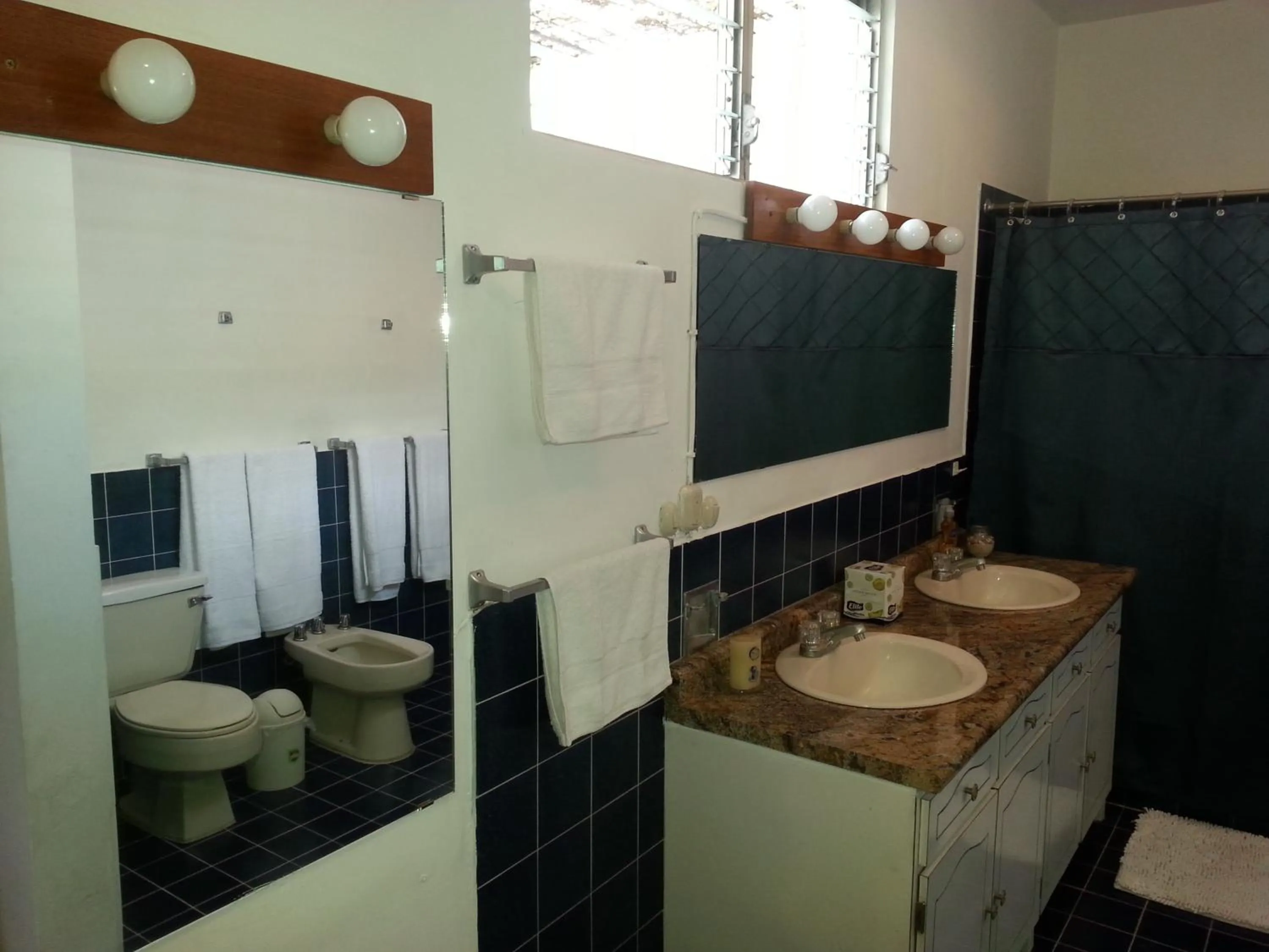 Bathroom in Suites & Apartments San Benito - Zona Rosa