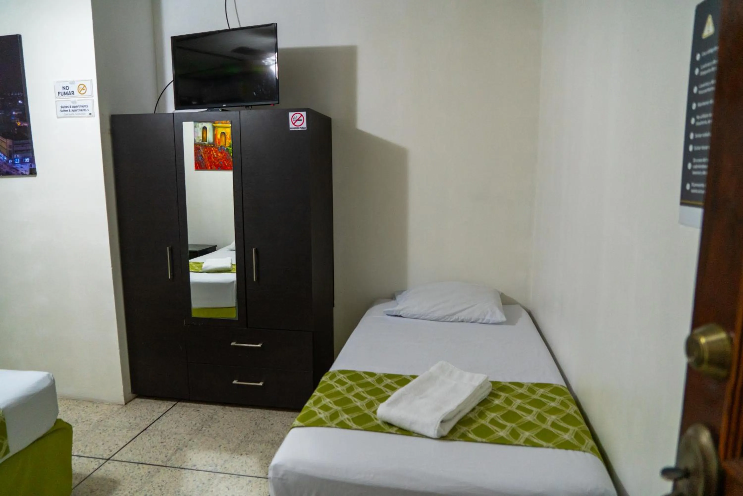 Bedroom, Bed in Suites & Apartments San Benito - Zona Rosa