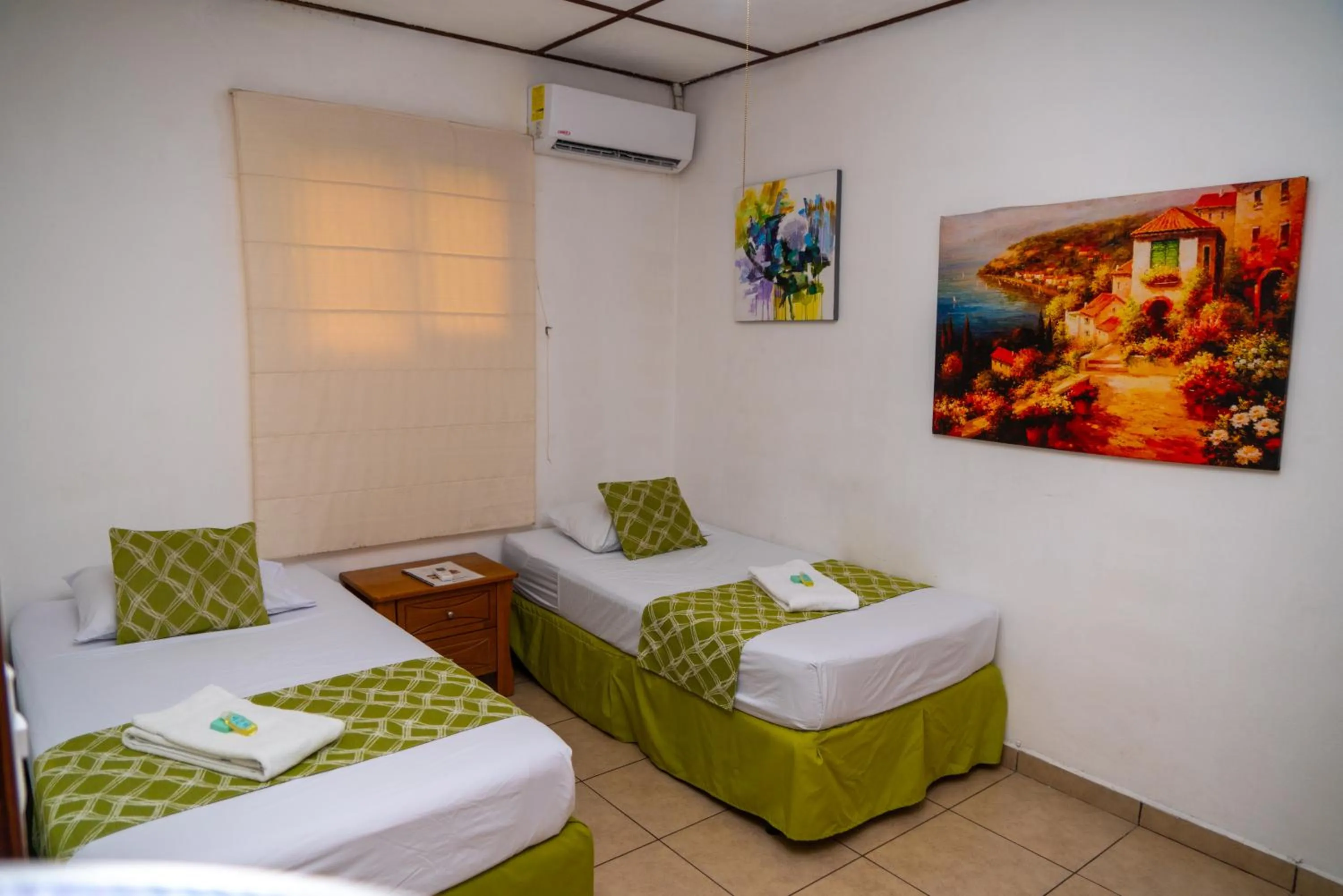 Bedroom, Bed in Suites & Apartments San Benito - Zona Rosa