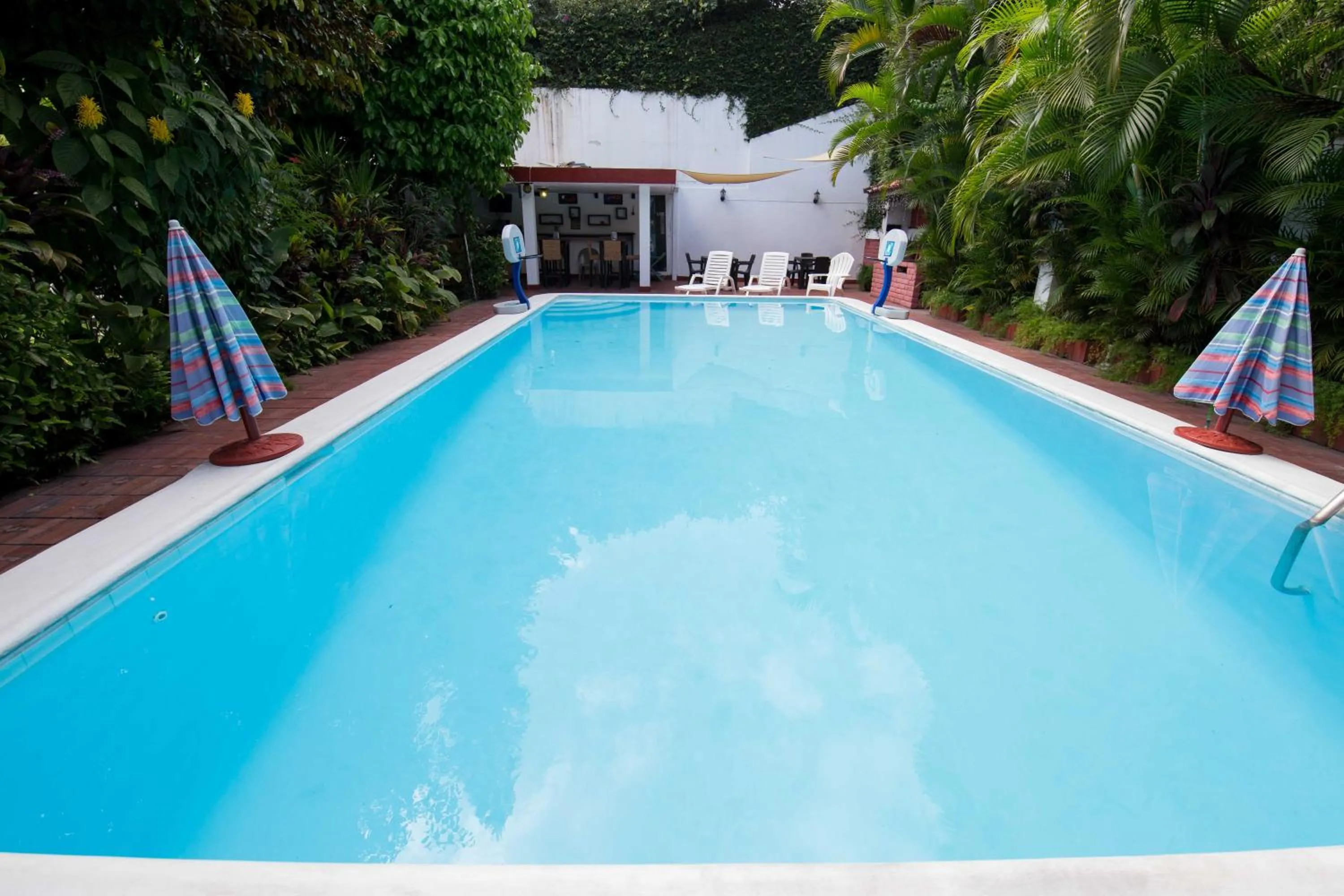 BBQ facilities in Suites & Apartments San Benito - Zona Rosa