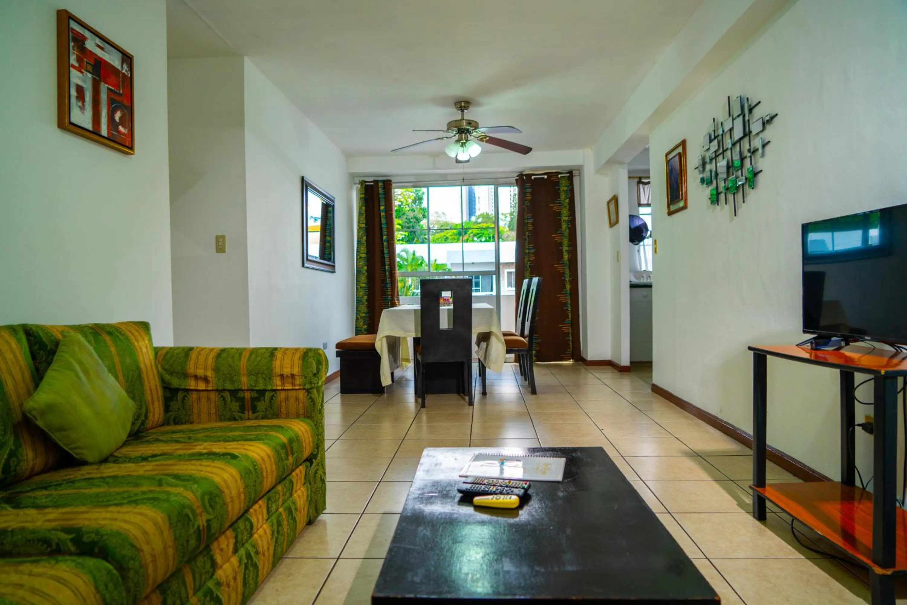 Communal lounge/ TV room in Suites & Apartments San Benito - Zona Rosa