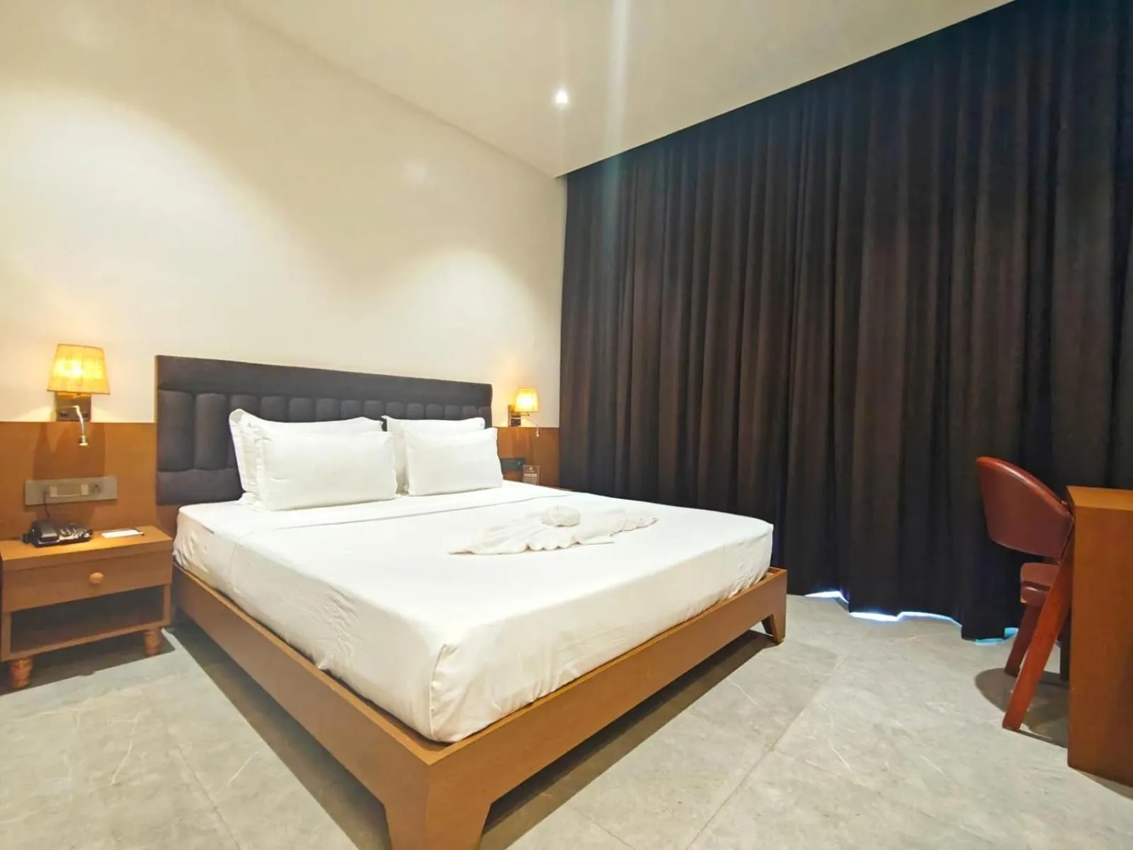 Bed in The S Crown Somnath