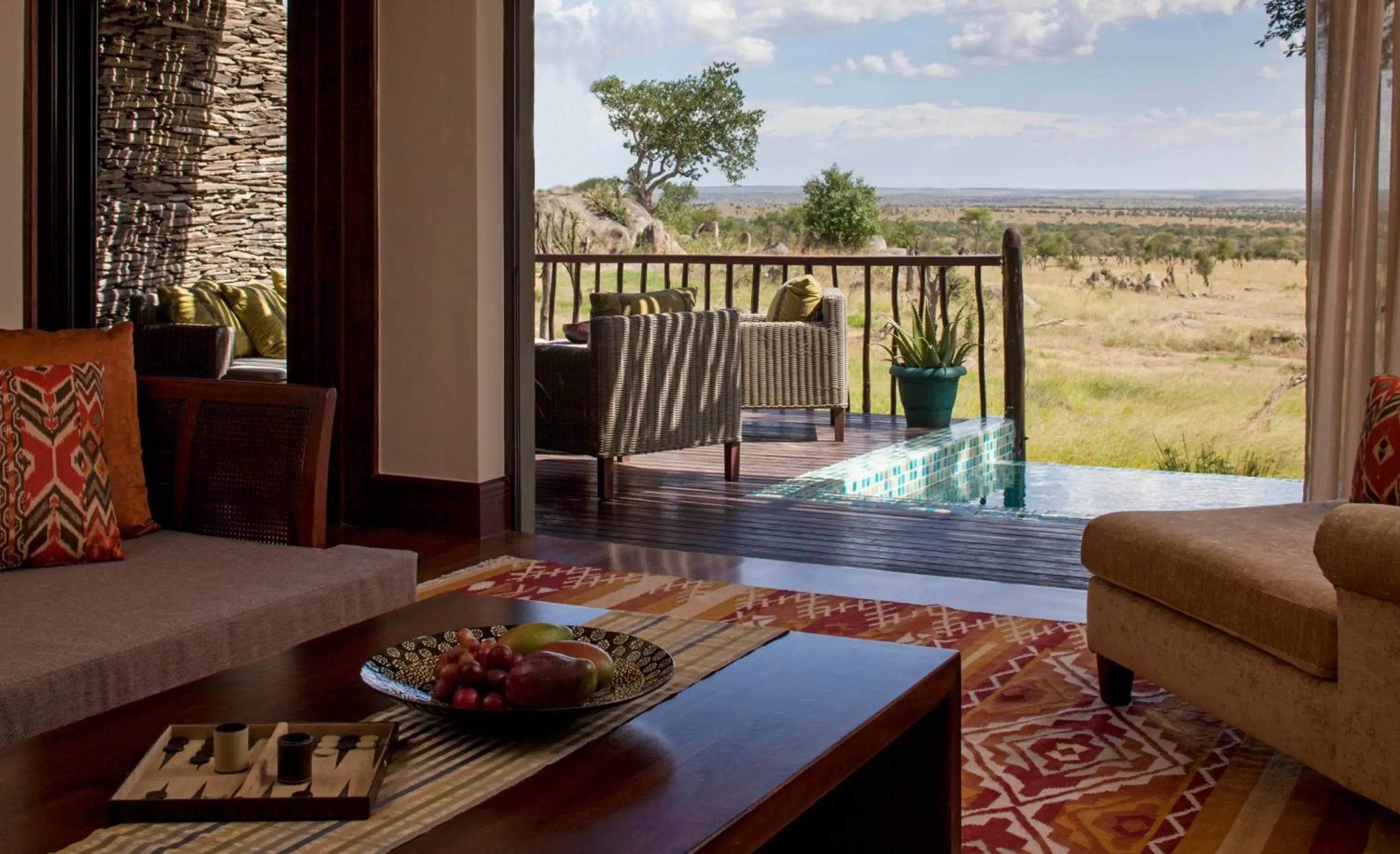 Terrace Suite Water Hole View King Bed - single occupancy in Four Seasons Safari Lodge Serengeti Terrace Suite Water Hole View King Bed - single occupancy in Four Seasons Safari Lodge Serengeti