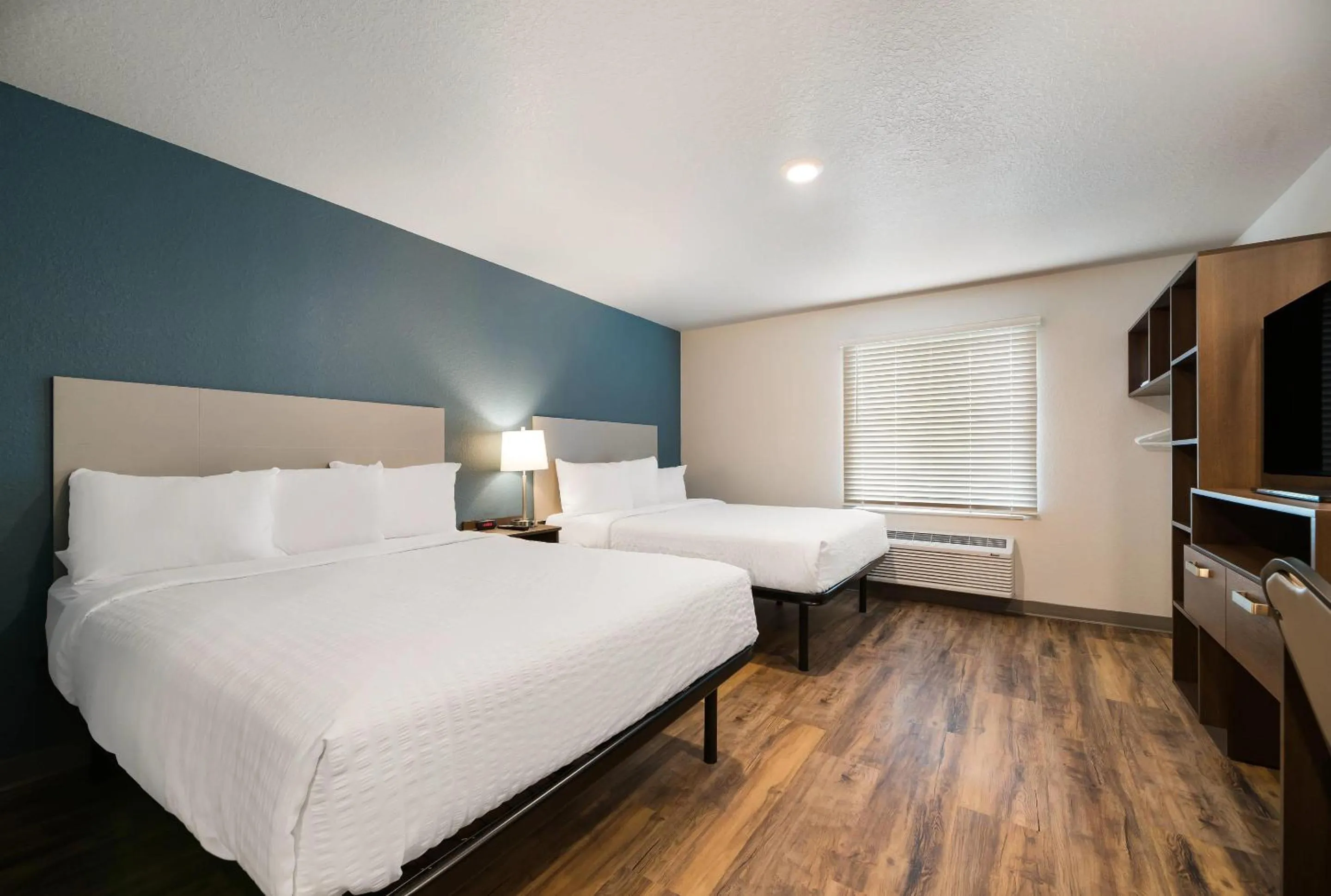 Bedroom, Bed in WoodSpring Suites Cocoa Beach - Rockledge