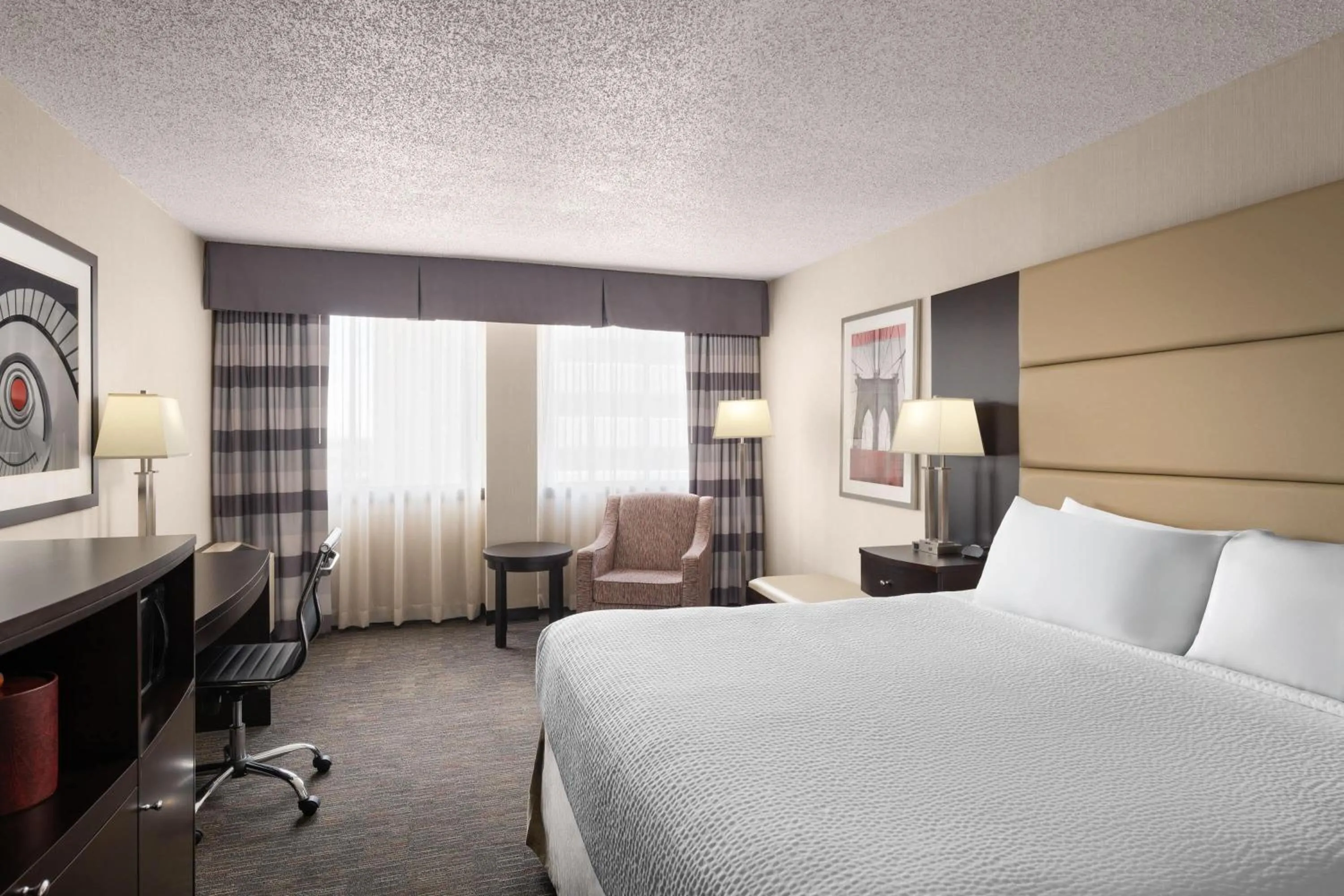 Photo of the whole room, Bed in Ramada Plaza by Wyndham Regina Downtown