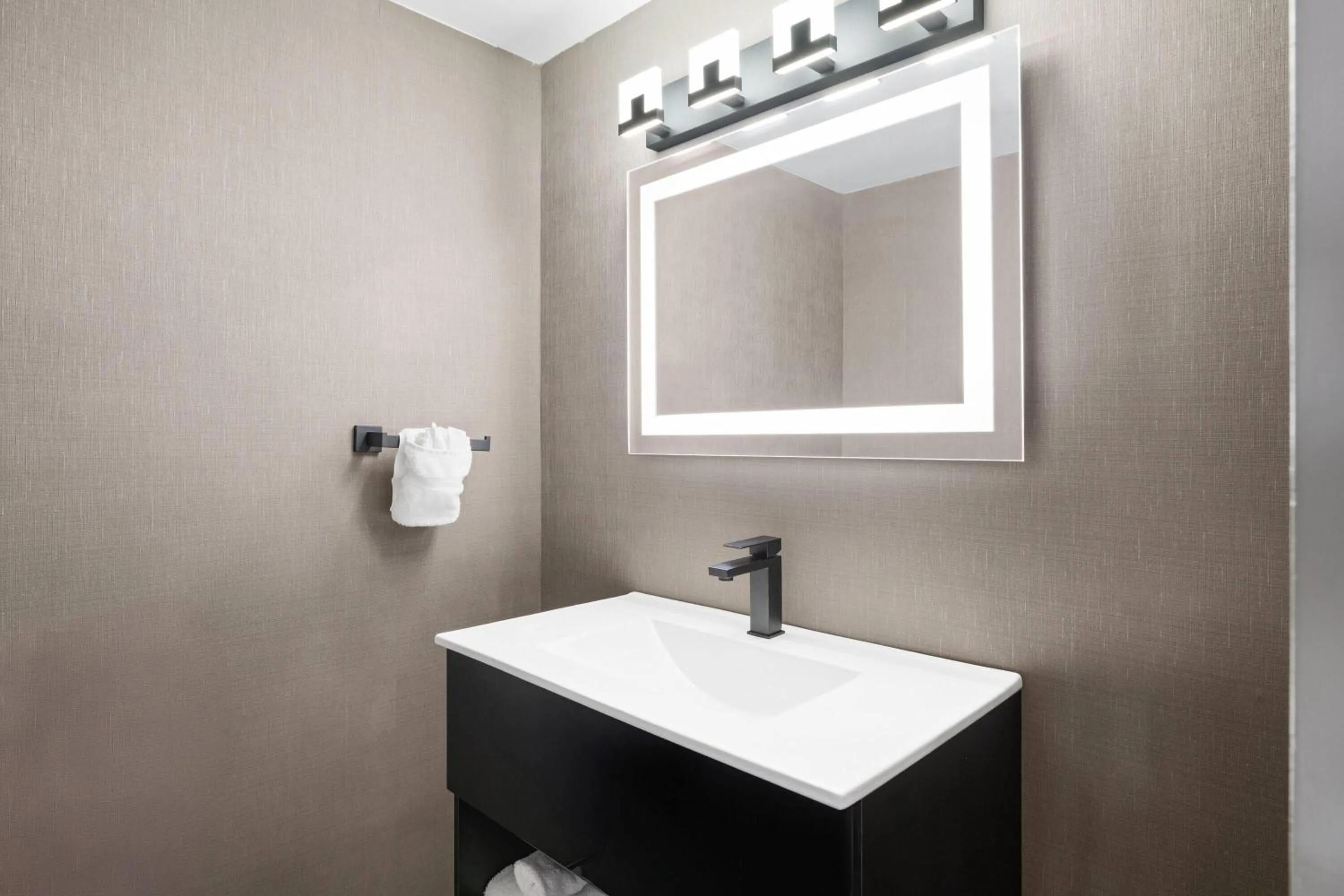 Bathroom in Ramada Plaza by Wyndham Regina Downtown