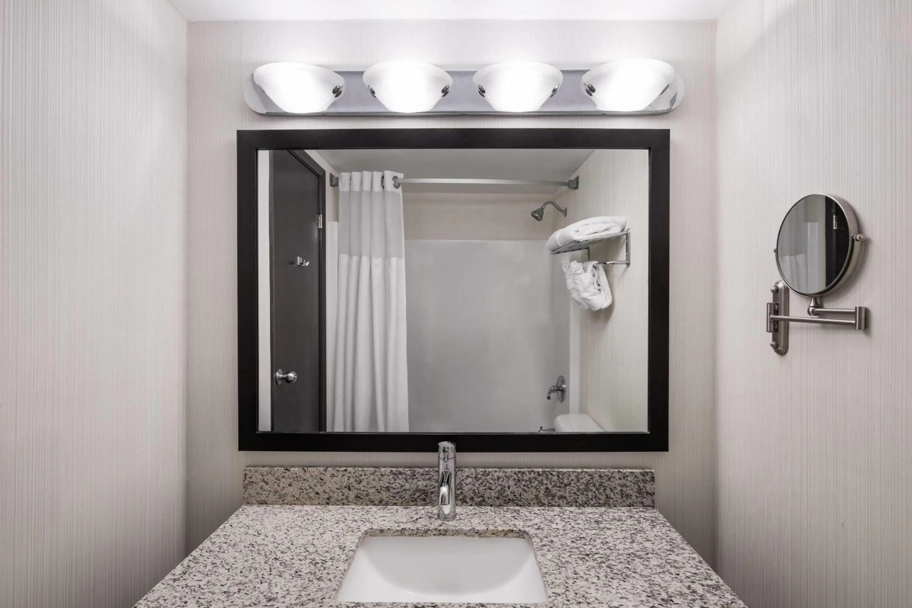 Bathroom in Ramada Plaza by Wyndham Regina Downtown