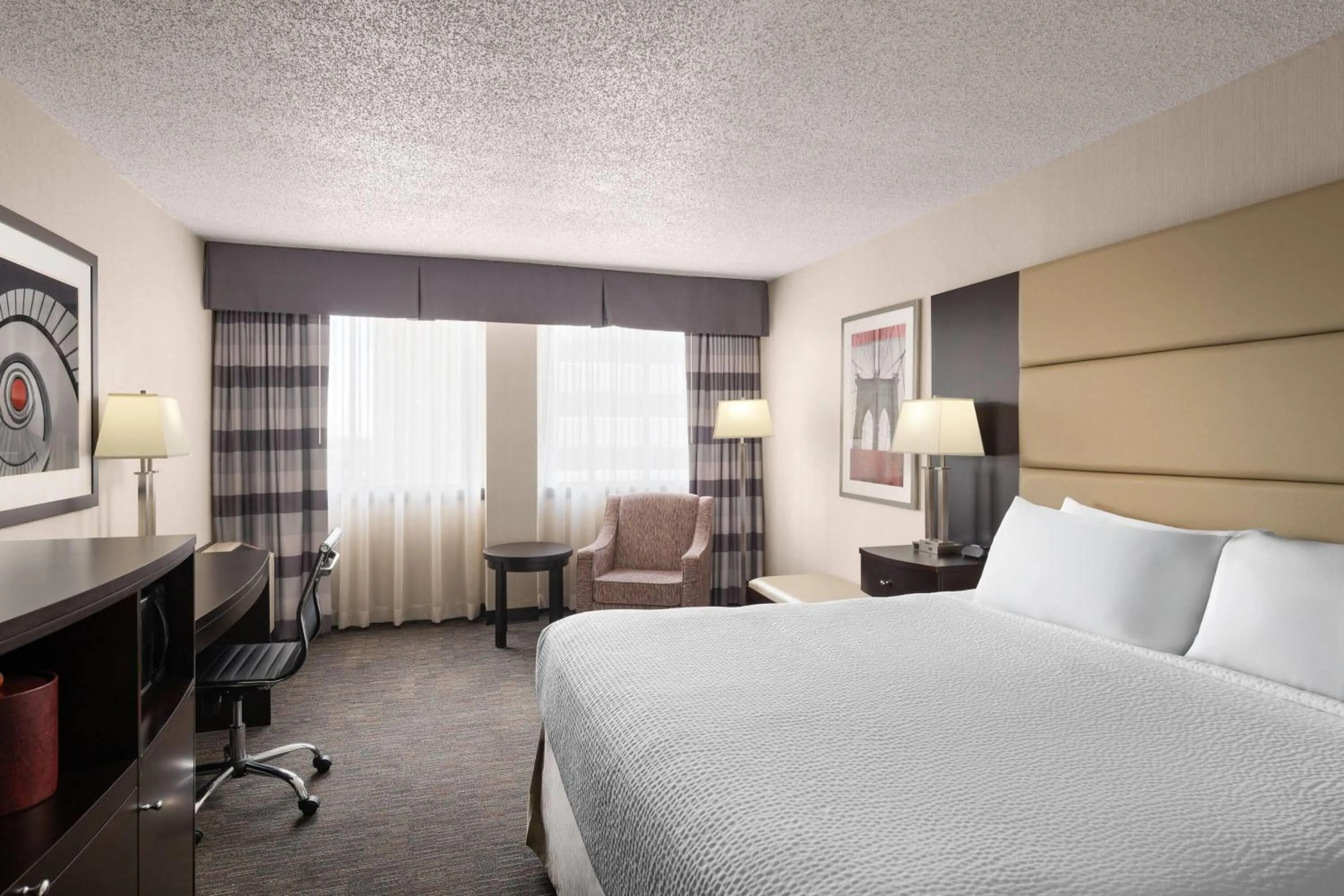 Photo of the whole room, Bed in Ramada Plaza by Wyndham Regina Downtown