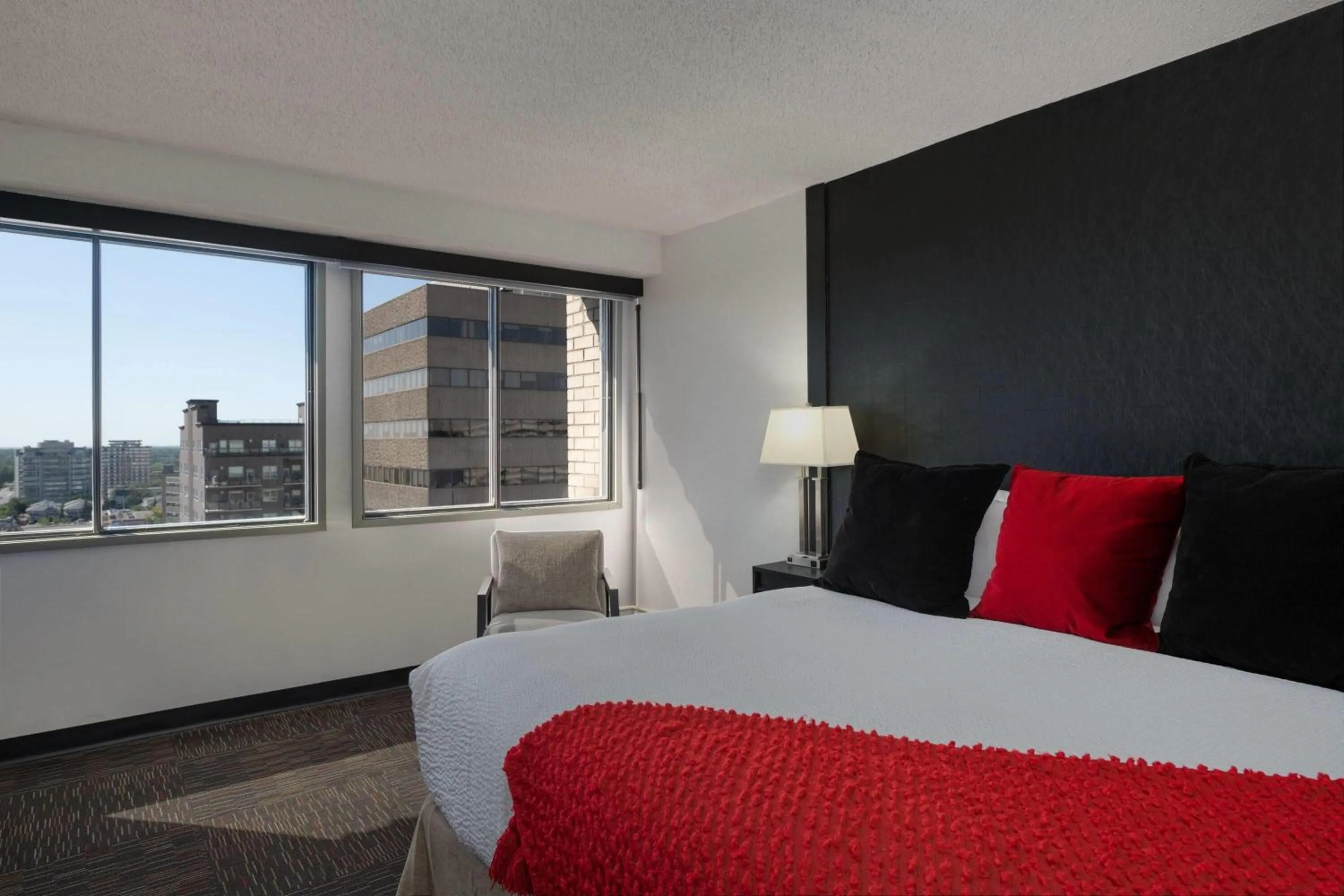 Photo of the whole room, Bed in Ramada Plaza by Wyndham Regina Downtown