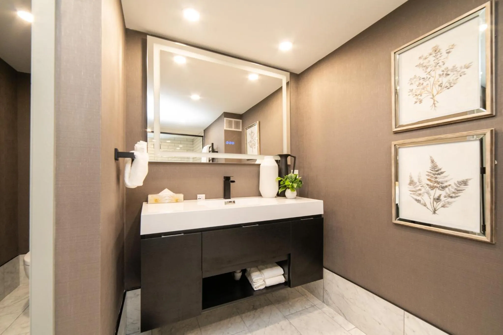 Bathroom in Ramada Plaza by Wyndham Regina Downtown