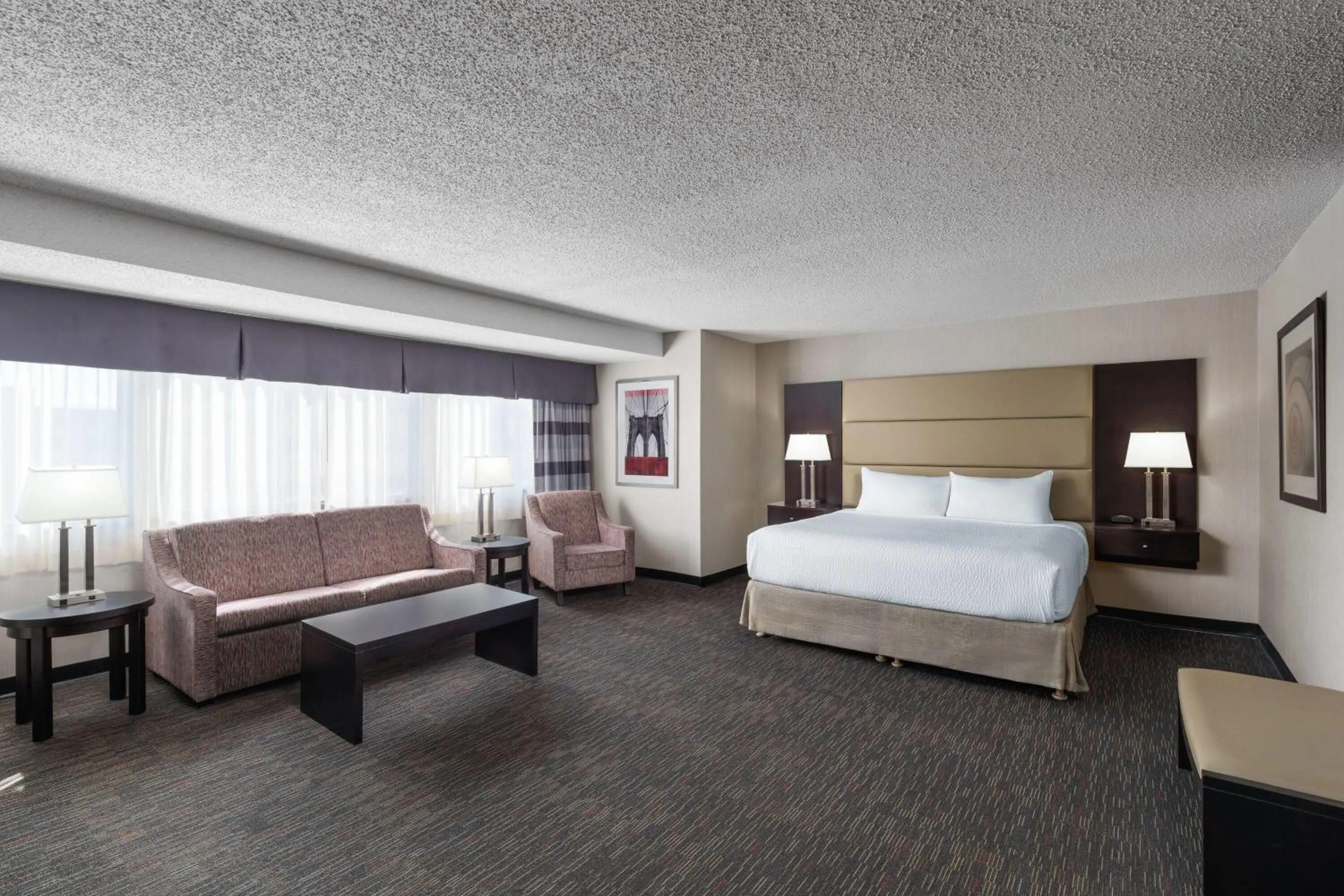 Photo of the whole room, Bed in Ramada Plaza by Wyndham Regina Downtown