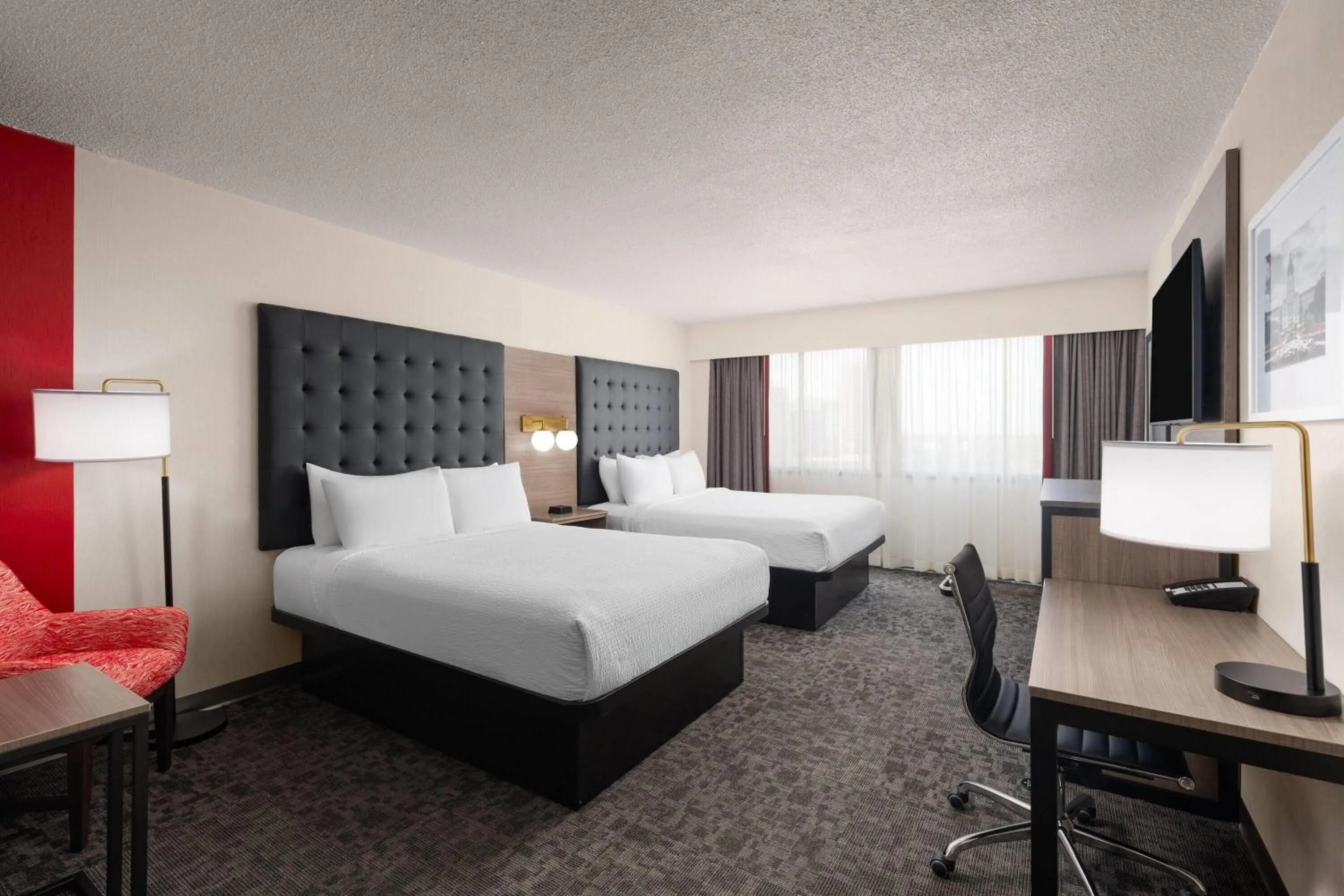 Photo of the whole room, Bed in Ramada Plaza by Wyndham Regina Downtown