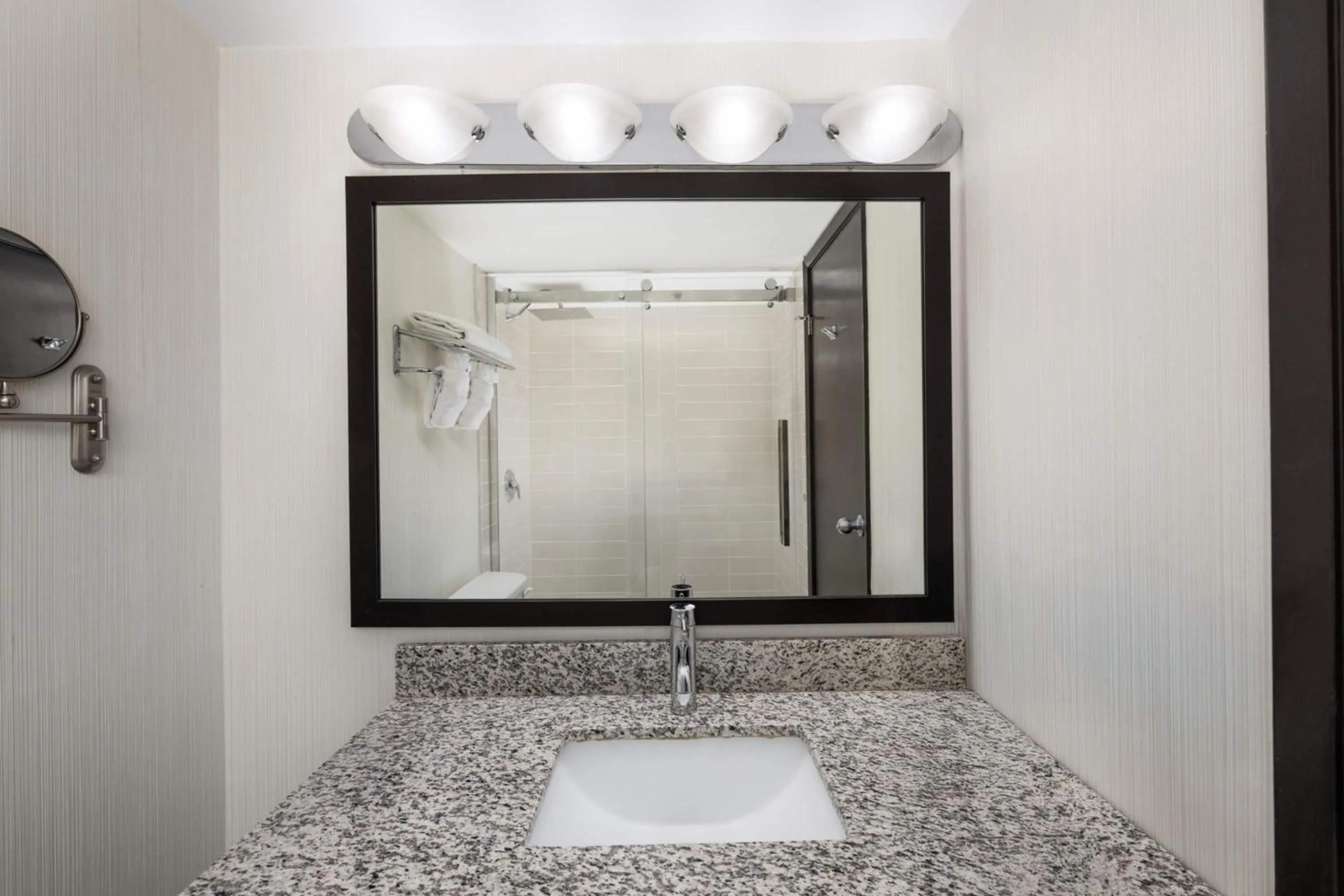 Bathroom in Ramada Plaza by Wyndham Regina Downtown