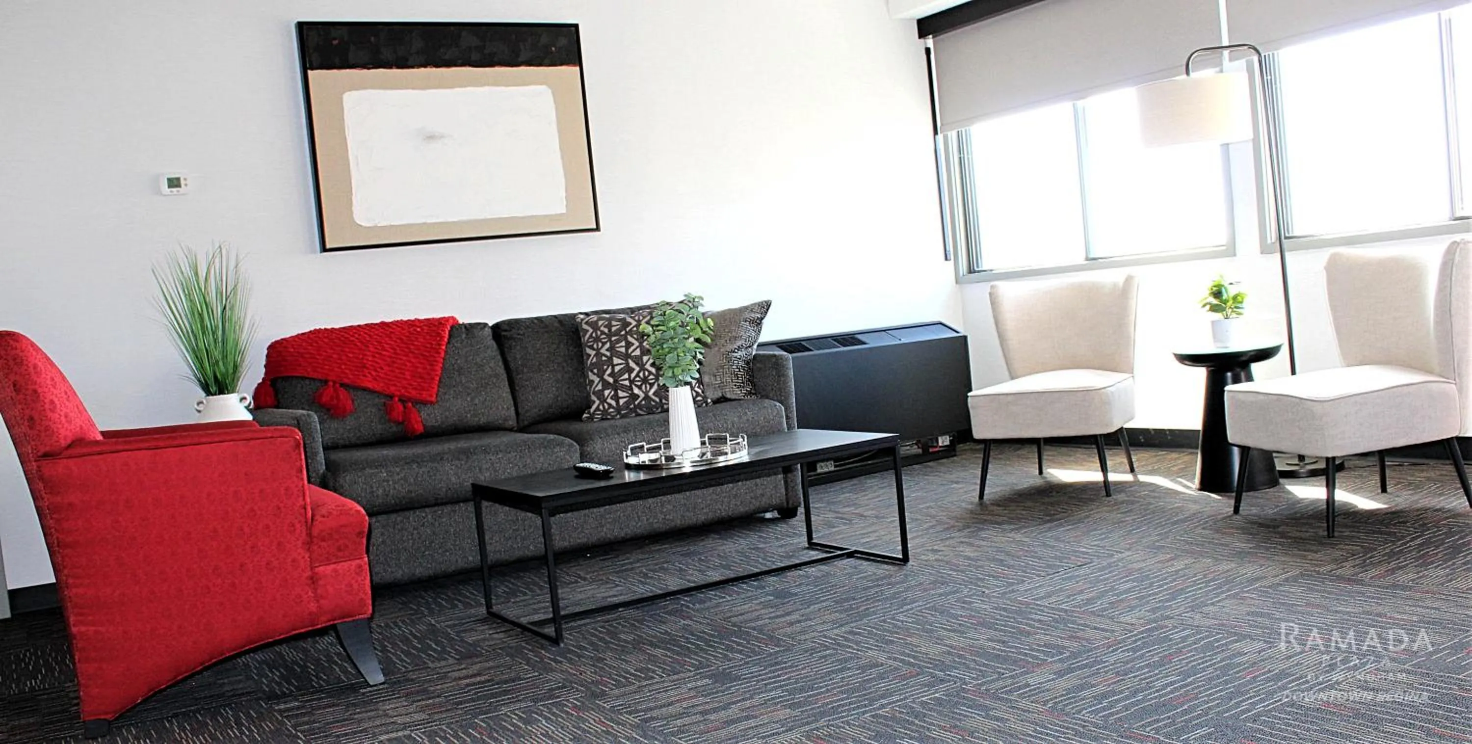 Living room in Ramada Plaza by Wyndham Regina Downtown