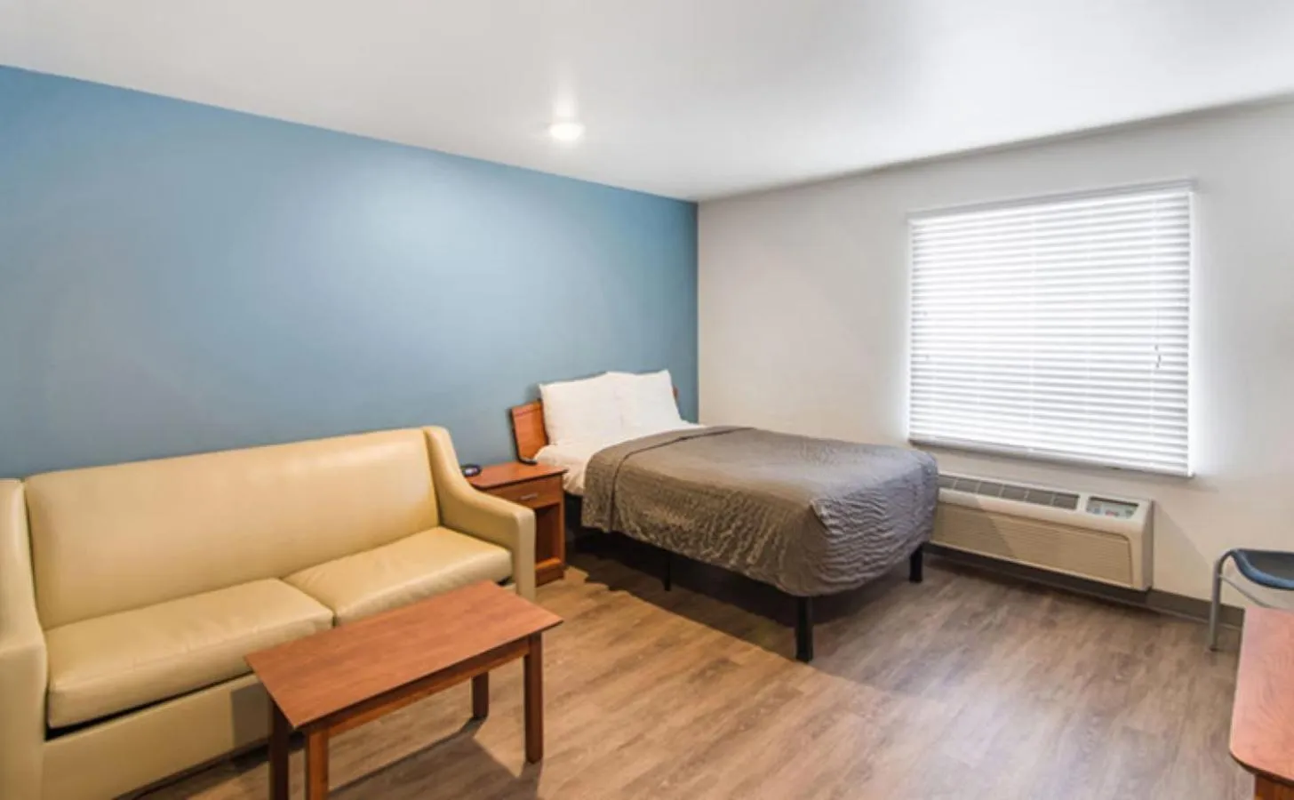 Photo of the whole room, Bed in WoodSpring Suites Port Orange - Daytona Beach