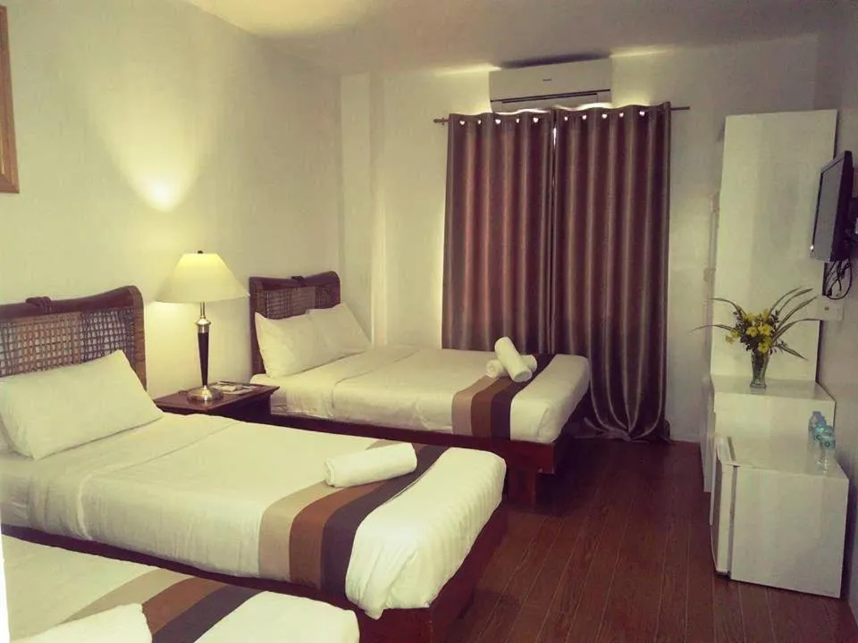 Bed in Discover Boracay Hotel