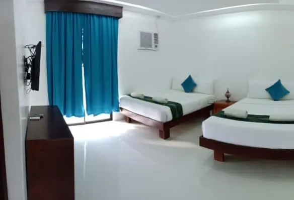 Bed in Discover Boracay Hotel