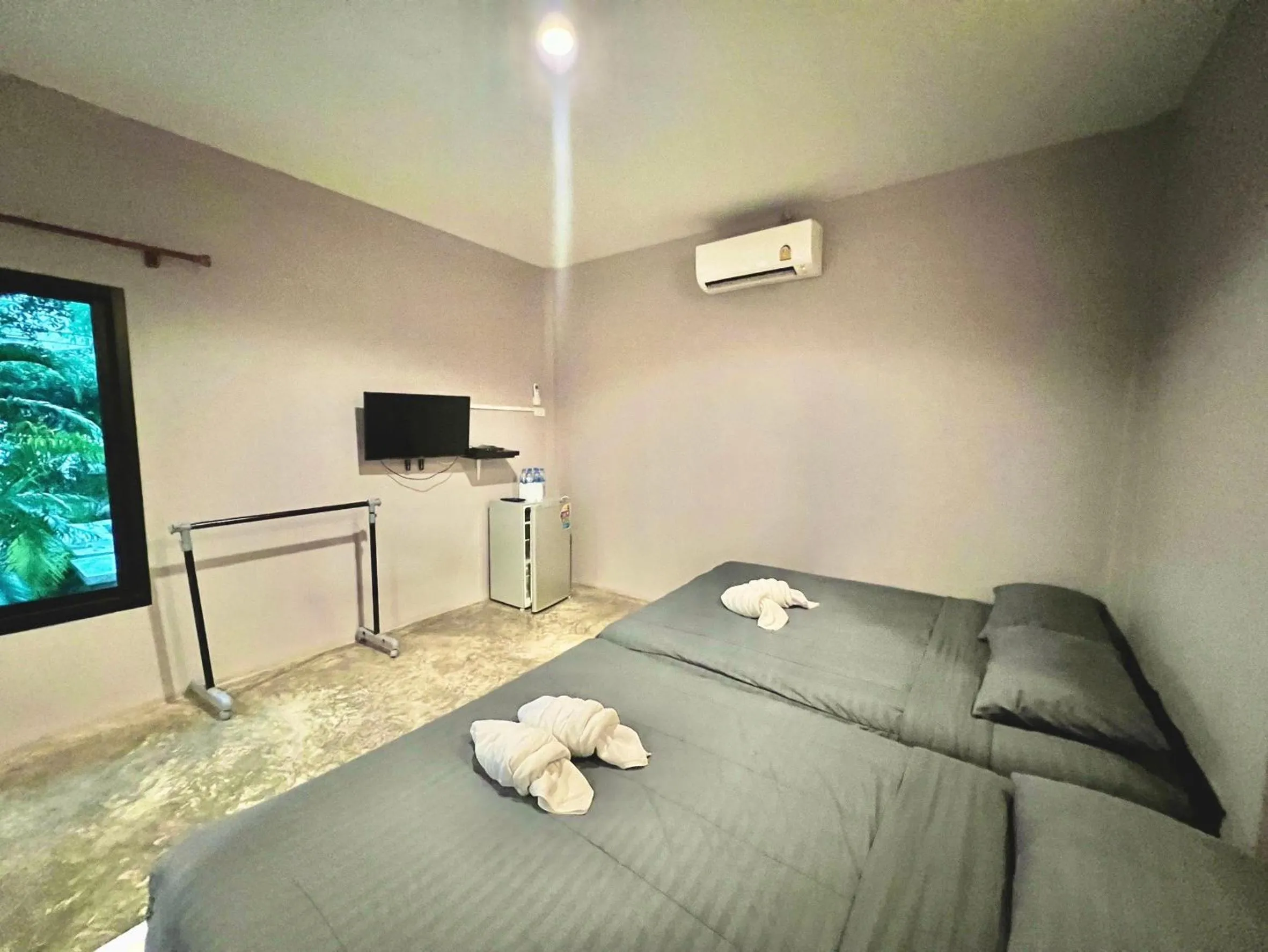 Bed in PHUPA BEACH Resort