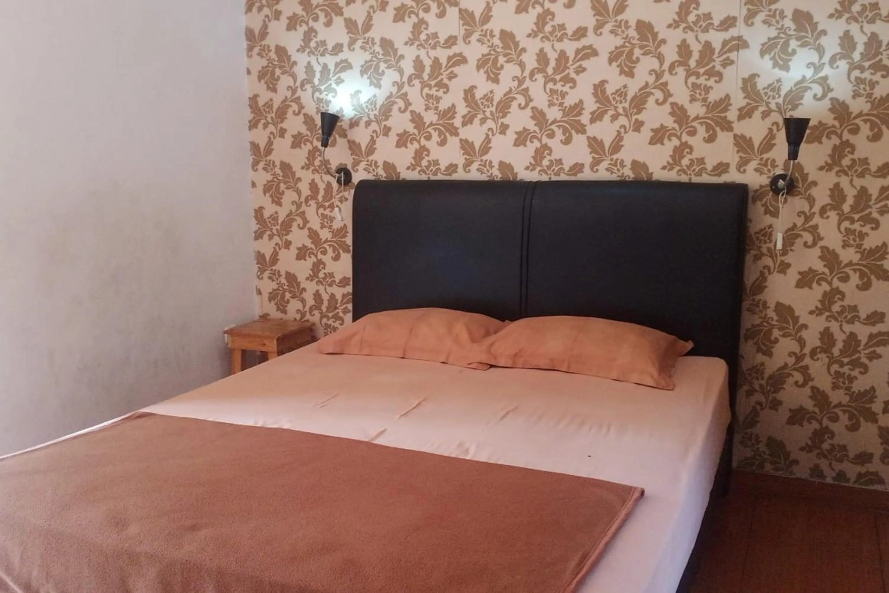 Bedroom, Bed in Aryani Suites Syariah